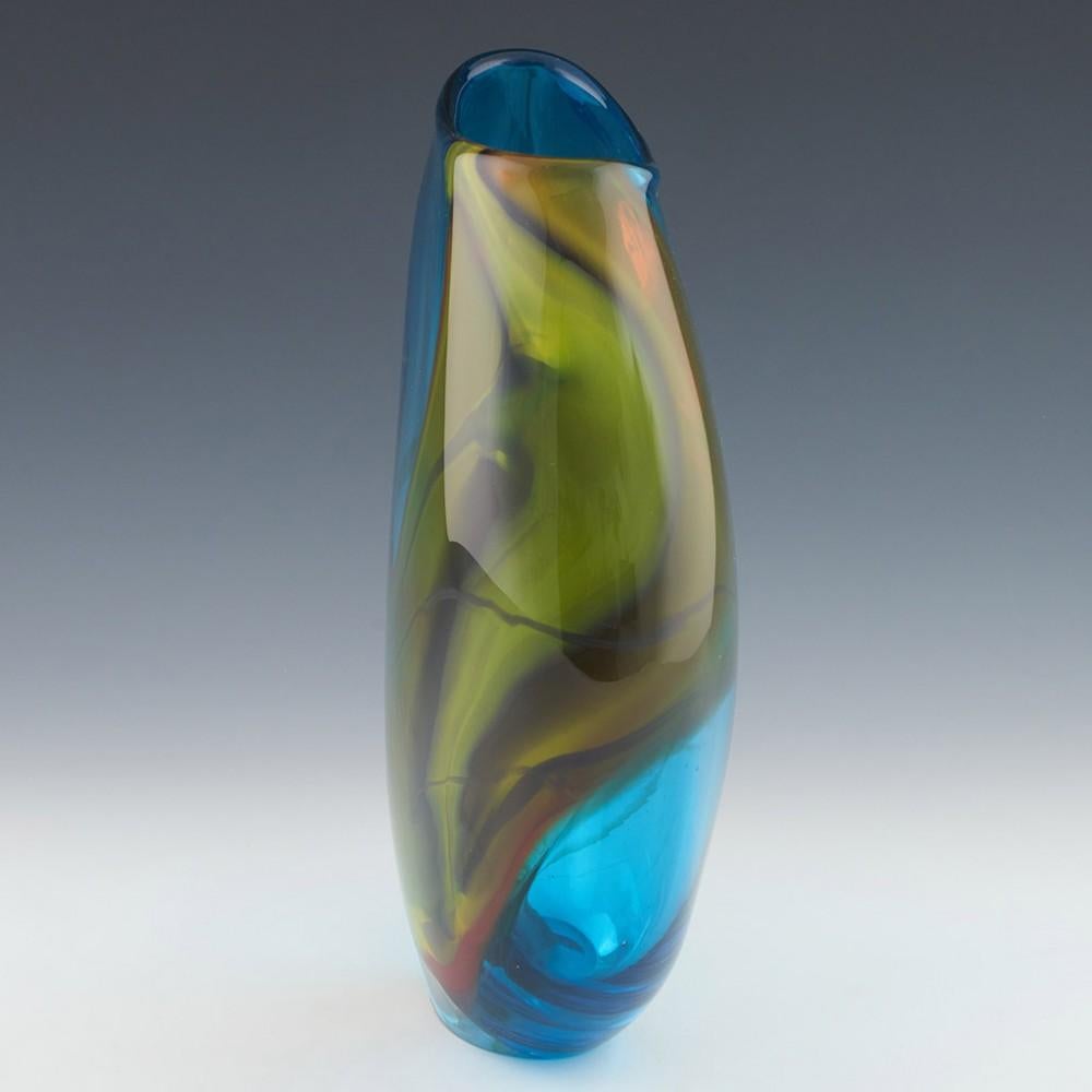 Phil Atrill Horizon Series Vase, 2013

Additional information:
Date : 2013
Origin : Surrey, England 
Bowl Features : Abstract asymmetrical form with swirling orangey-browns, yellows, and blue
Marks : Signed Phil Atrill 
Type : Lead 
Size : H