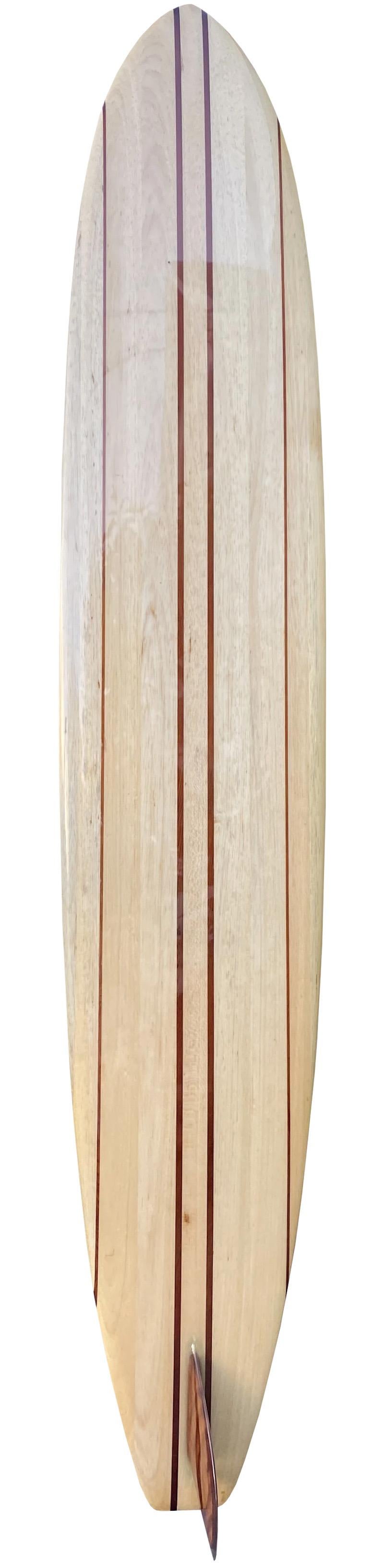 1995 Phil Edwards shaped balsawood longboard. Features a Classic 60s longboard design with 4-stringers of redwood and stunning redwood fin. Rare black/white logo of arguably one of the most iconic surfing photographs of the 1990s showing Phil