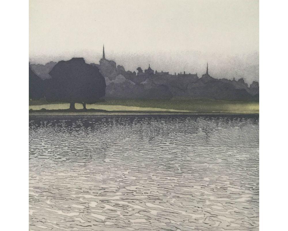 Spires is a contemporary landscape print by Phil Greenwood. The strong outline of the spires is softened by blue haze. A green river bank splits the work into three planes and allows to appreciate the attention to detail throughout the print,