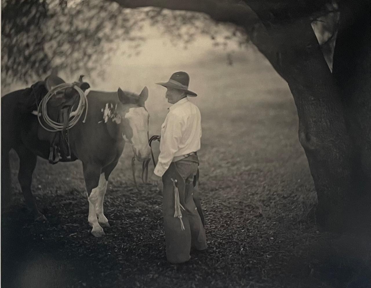 Phil Kember Black and White Photograph - Big Oak, Cowboy with Horse by Tree Sepia Toned