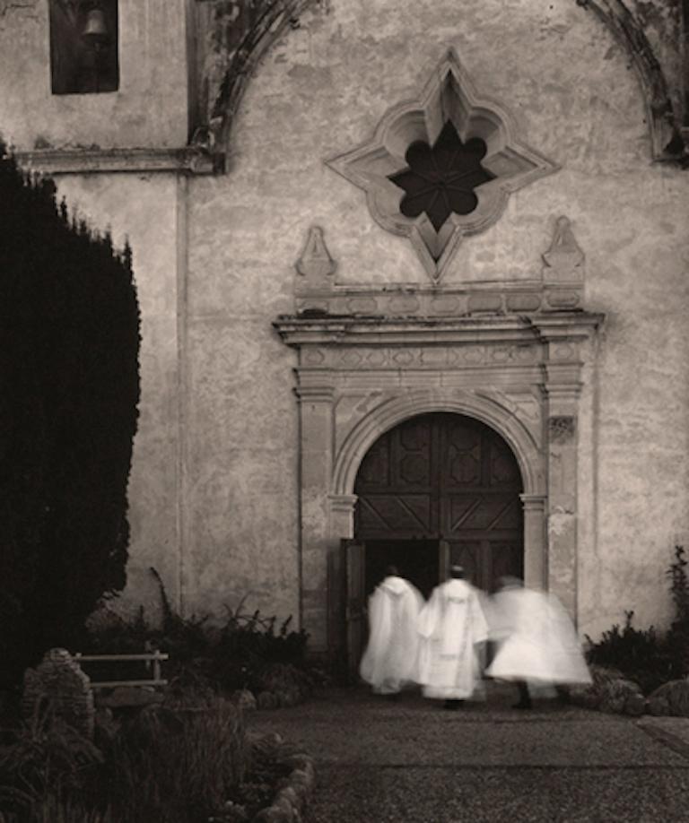 Phil Kember Black and White Photograph - Christmas Mass, Mission Basilica Catholic Church Carmel California 
