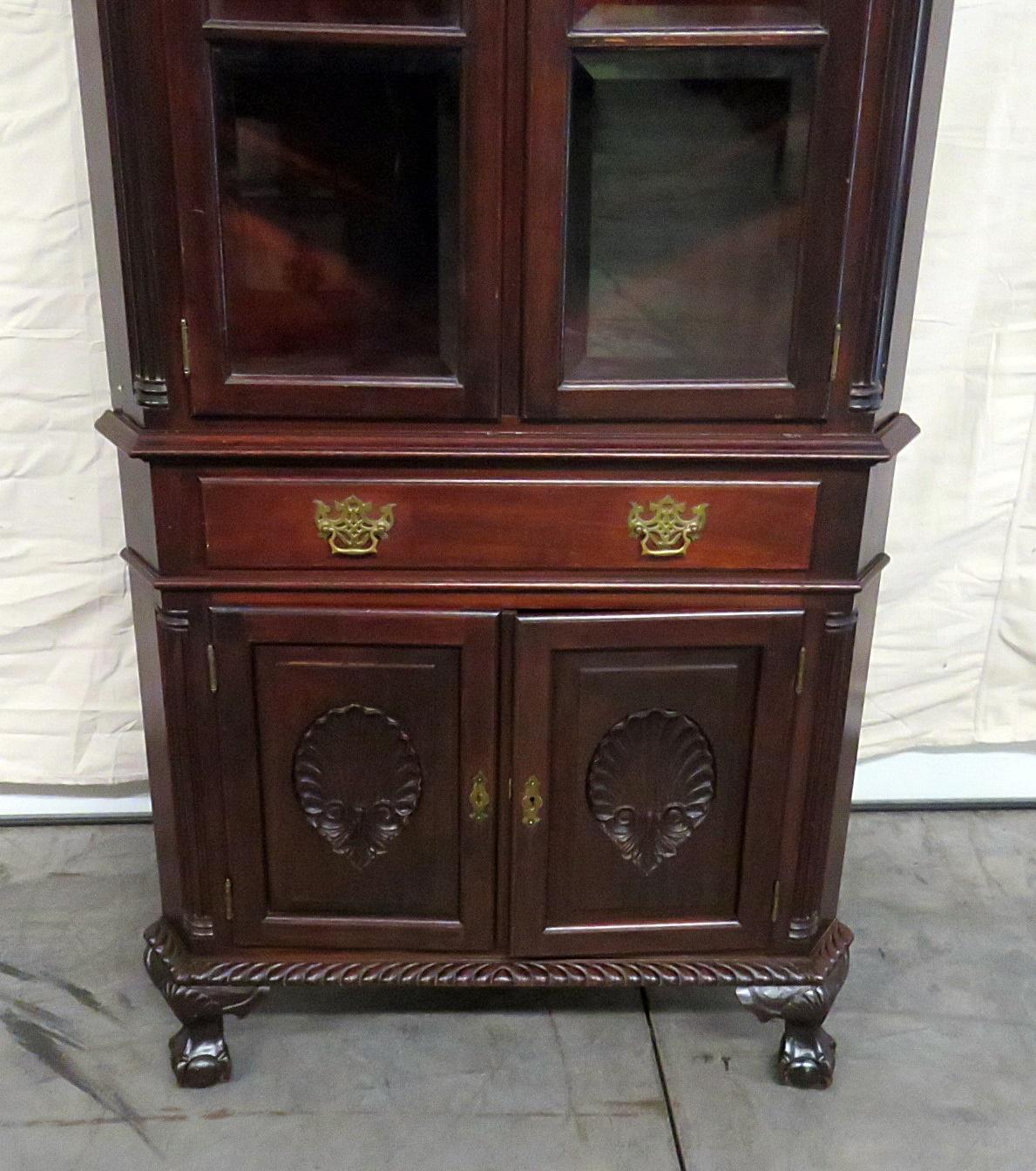 RJ Horner Philadelphia Centennial Chippendale style corner cabinet 2 doors with 3 shelves over 1 drawer and 2 doors.