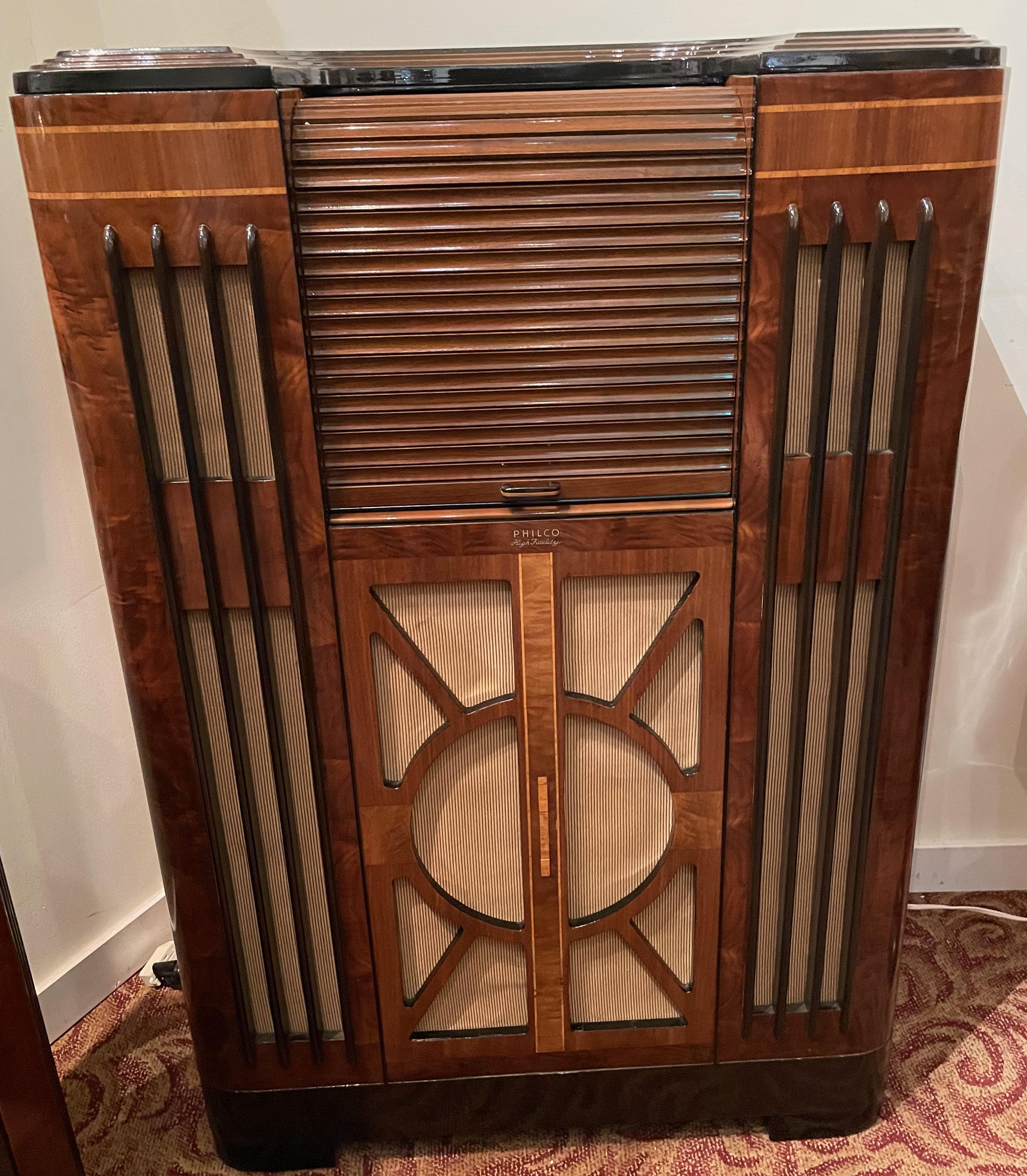 The 38-690 was Philco’s top-of-the-line radio for the 1938 model year. It is a 20-tube all-wave receiver housed in an impressive cabinet that for sure embraces the fundamental essences of Art Deco machine-age design. Referred to by Philco as Super