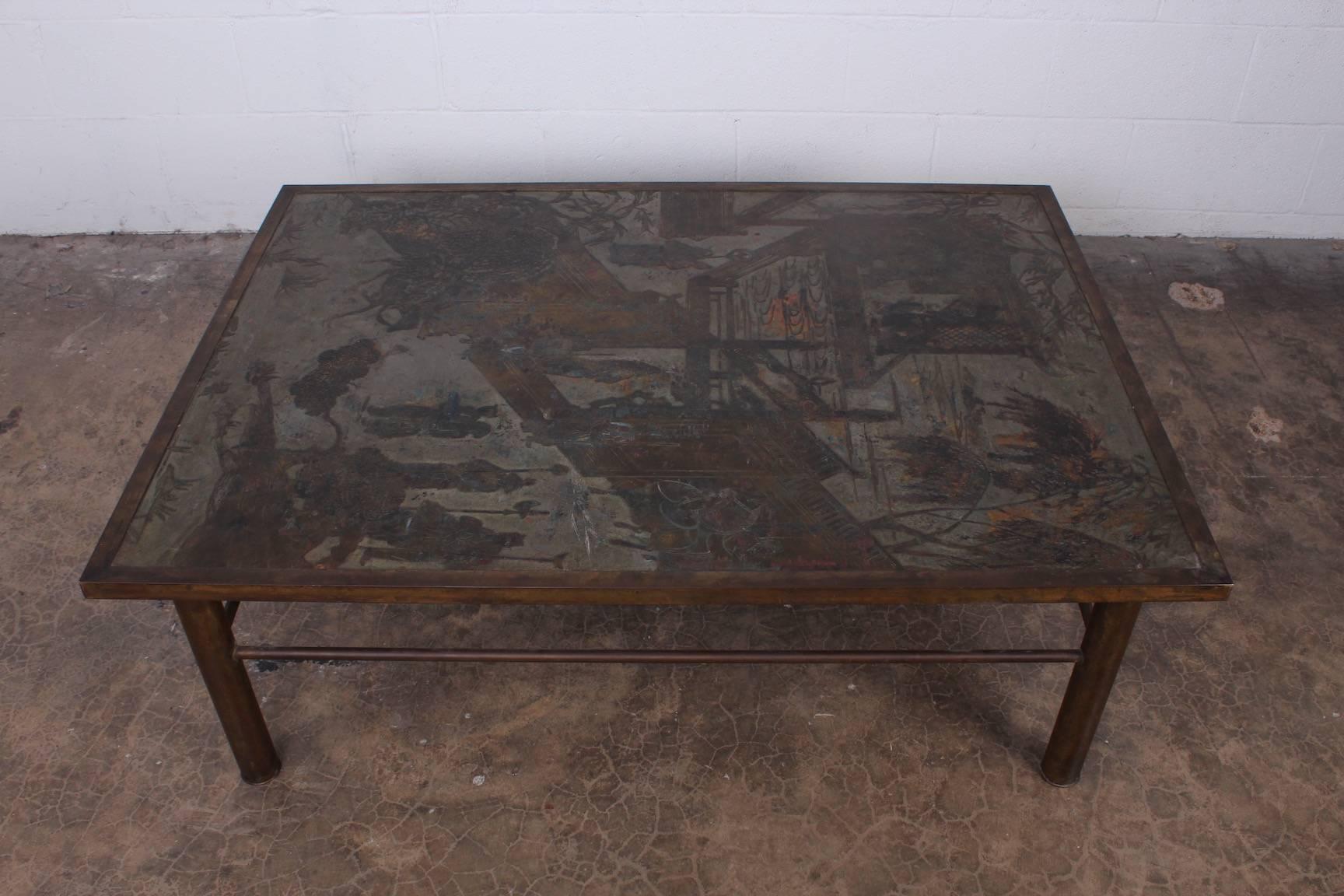 A bronze Chan coffee table designed by Philip and Kelvin LaVerne.