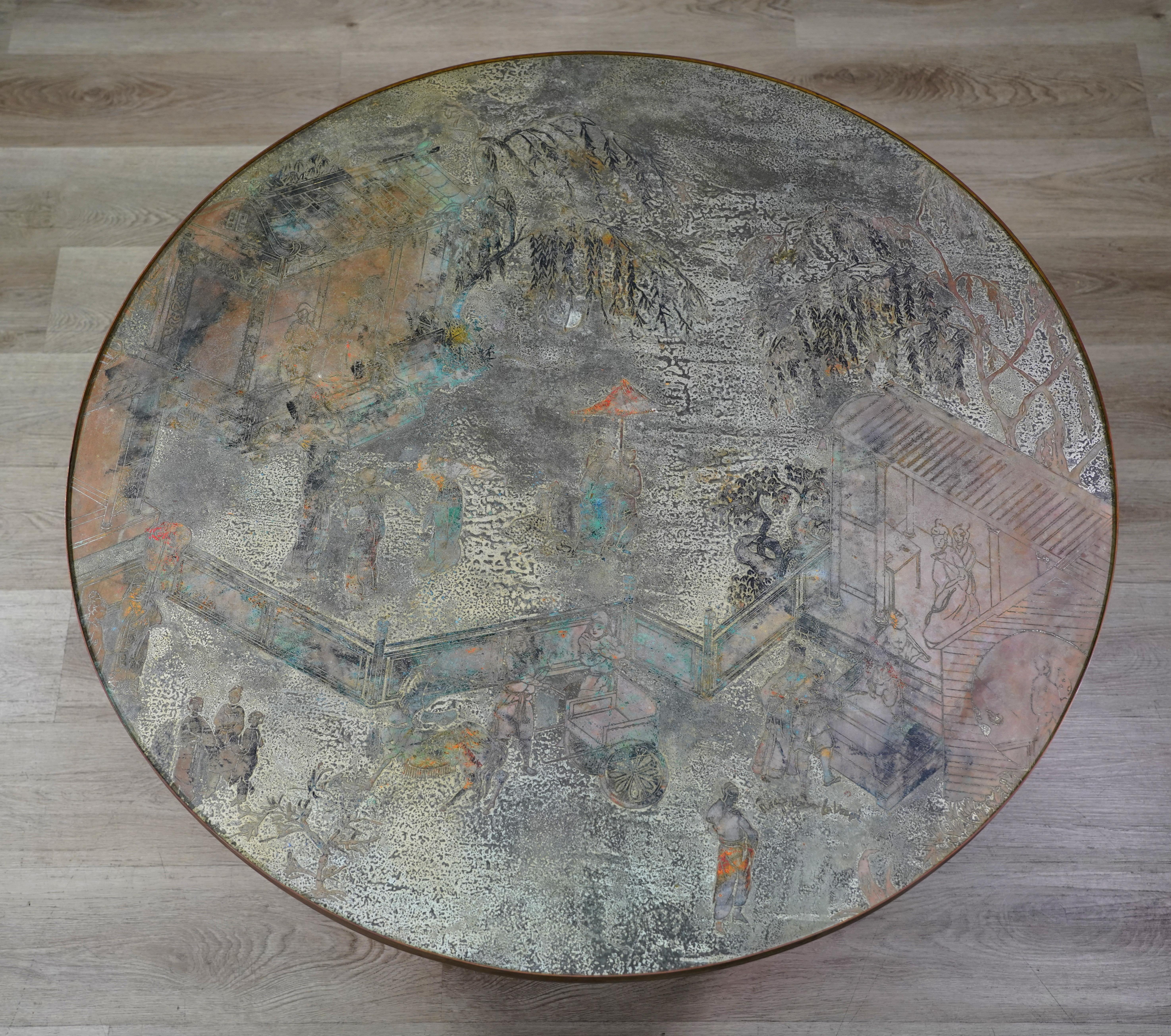 Beautiful 1960s Philip and Kelvin LaVerne round coffee table. This Chinoiserie table from the iconic father and son duo is patinated bronze and etched pewter on an octagonal base. Signed on tabletop. A work of art, guaranteed to elevate any living