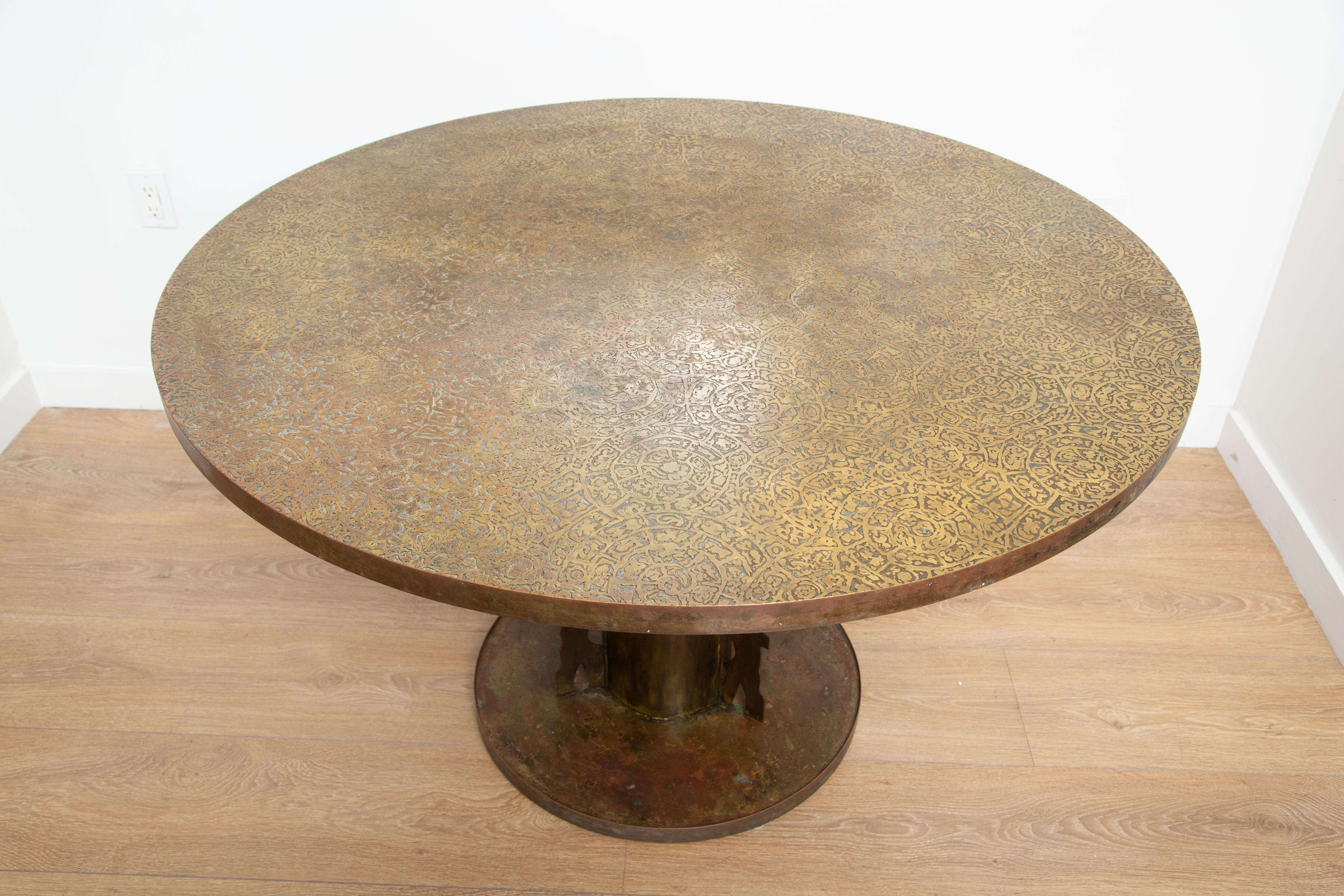 Philip and Kelvin LaVerne etruscan center table, New York, circa 1960's,
Bronze, hand sculptured, inlaid with pewter, buried in earth to attain natural and subtle patinas. Depicting Etruscan spiral patterns
Etched signature to the base. 
Excellent