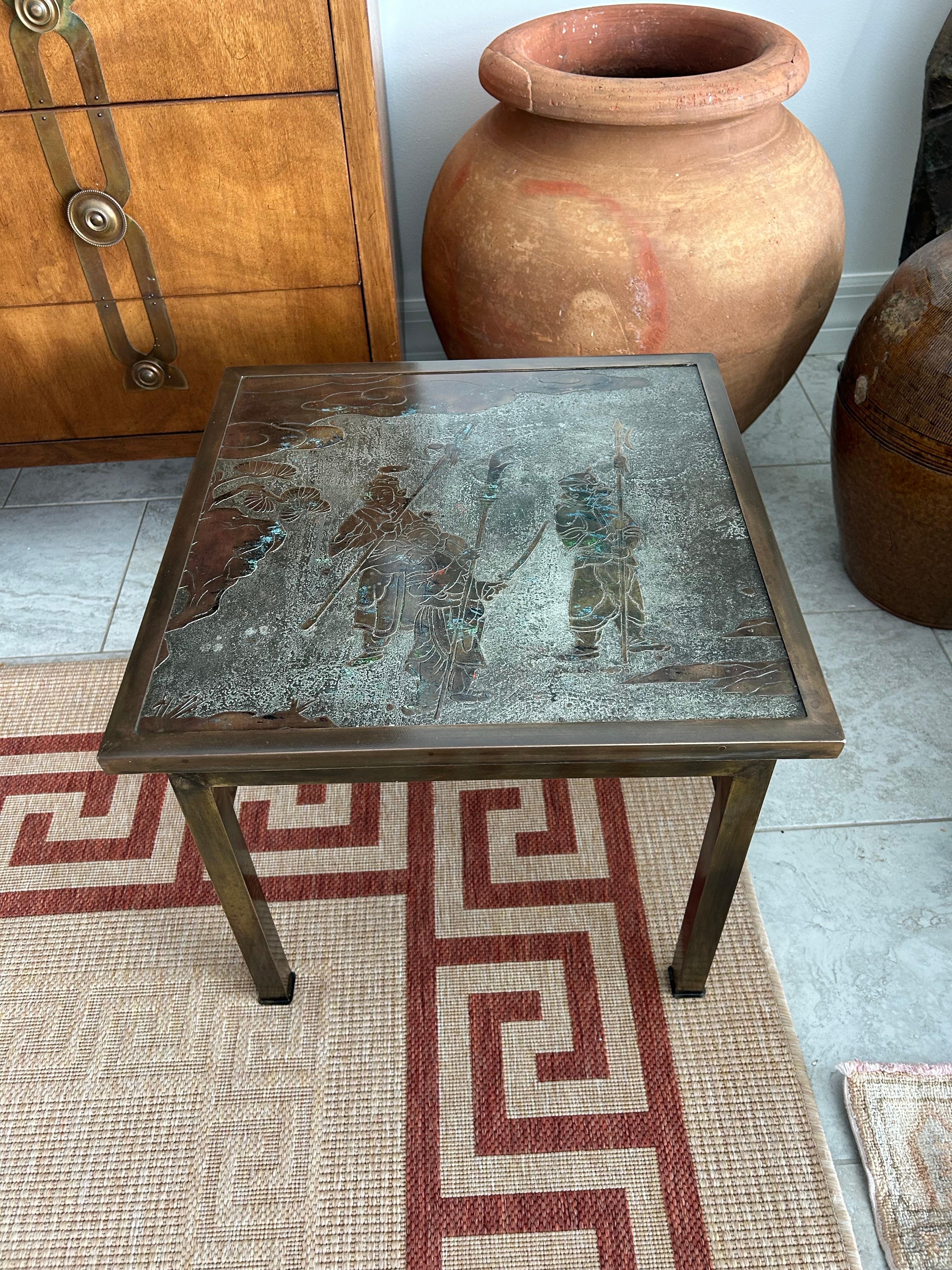 An exceptional Ming, low table by Philip and Kelvin Laverne in pewter and bronze circa 1960s . nicely patinated, and engraved with hand painted enamel in red and green… Signed PK Laverne… 16H x18x18. vibrant surfaces and details .