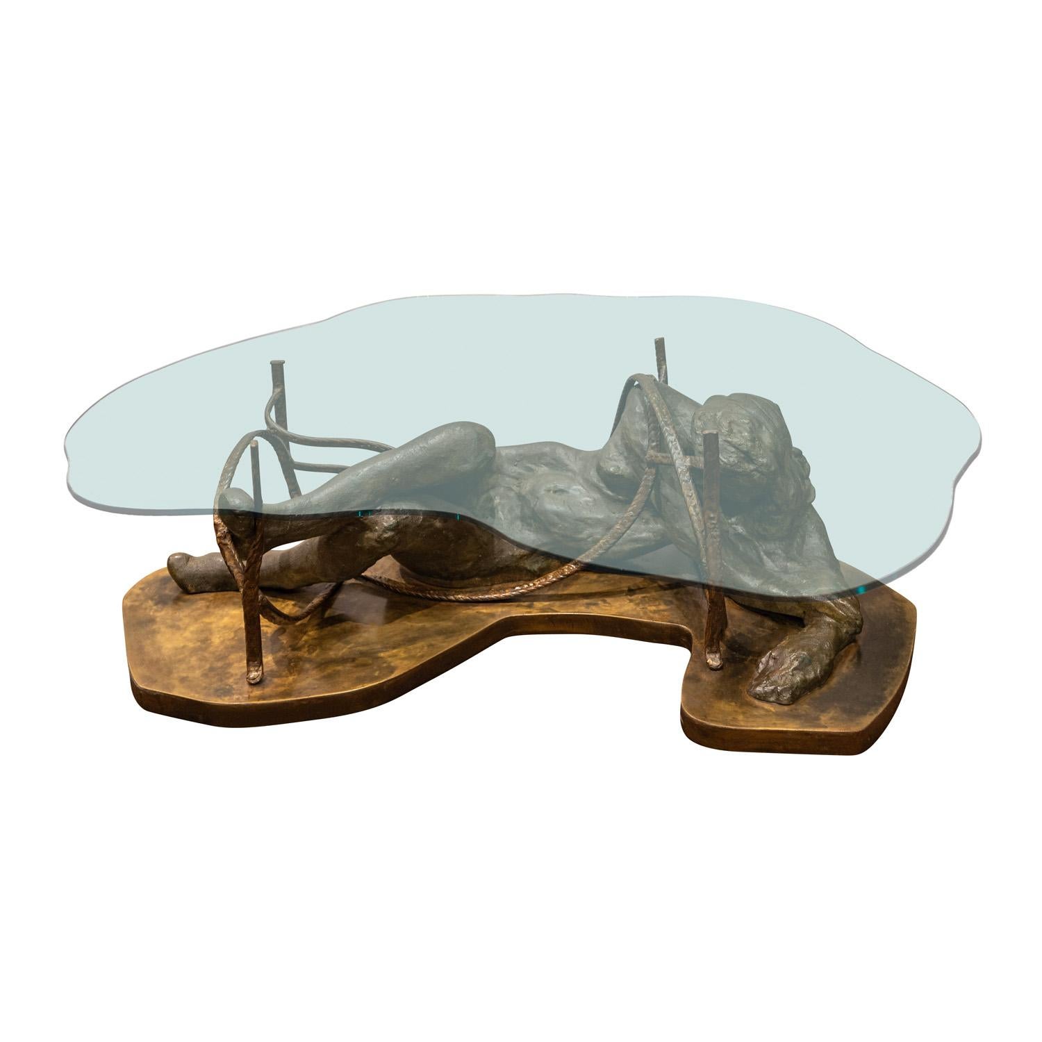 Rare and important “Repose” coffee table with cast bronze female nude on a patinated base with bronze tones,  welded cords and glass top by Philip & Kelvin LaVerne, American 1970s (signed “Philip Kelvin LaVerne” on base).  This was done in an