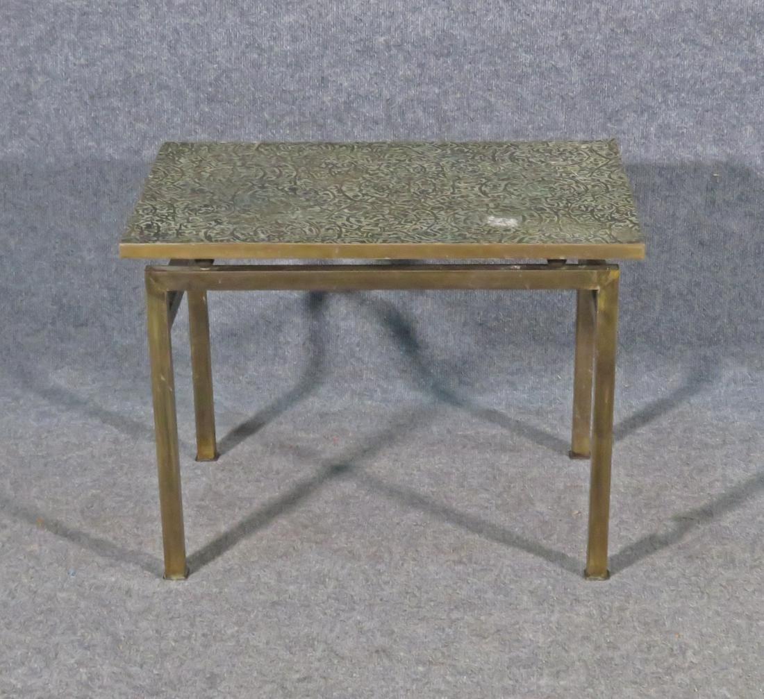 Vintage modern Philip and Kelvin Laverne side table featuring an etched bronze Etruscan spiral pattern designed top.

Please confirm item location (NY or NJ).