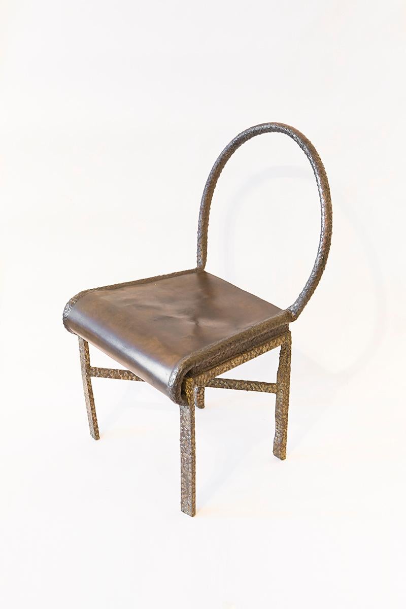 Philip and Kelvin LaVerne

Cross base chair
Bronze, circa 1970s
Measures: 33” H x 19” W x 16” D
(84cm x 48cm x 41cm)

Philip and Kelvin LaVerne are an American collaborative-design father and son duo. They are best known for melding motifs