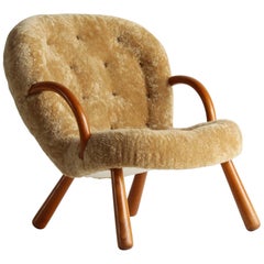 Philip Arctander, Clam Armchair Beige Lambskin and Stained Beech, Denmark, 1940s