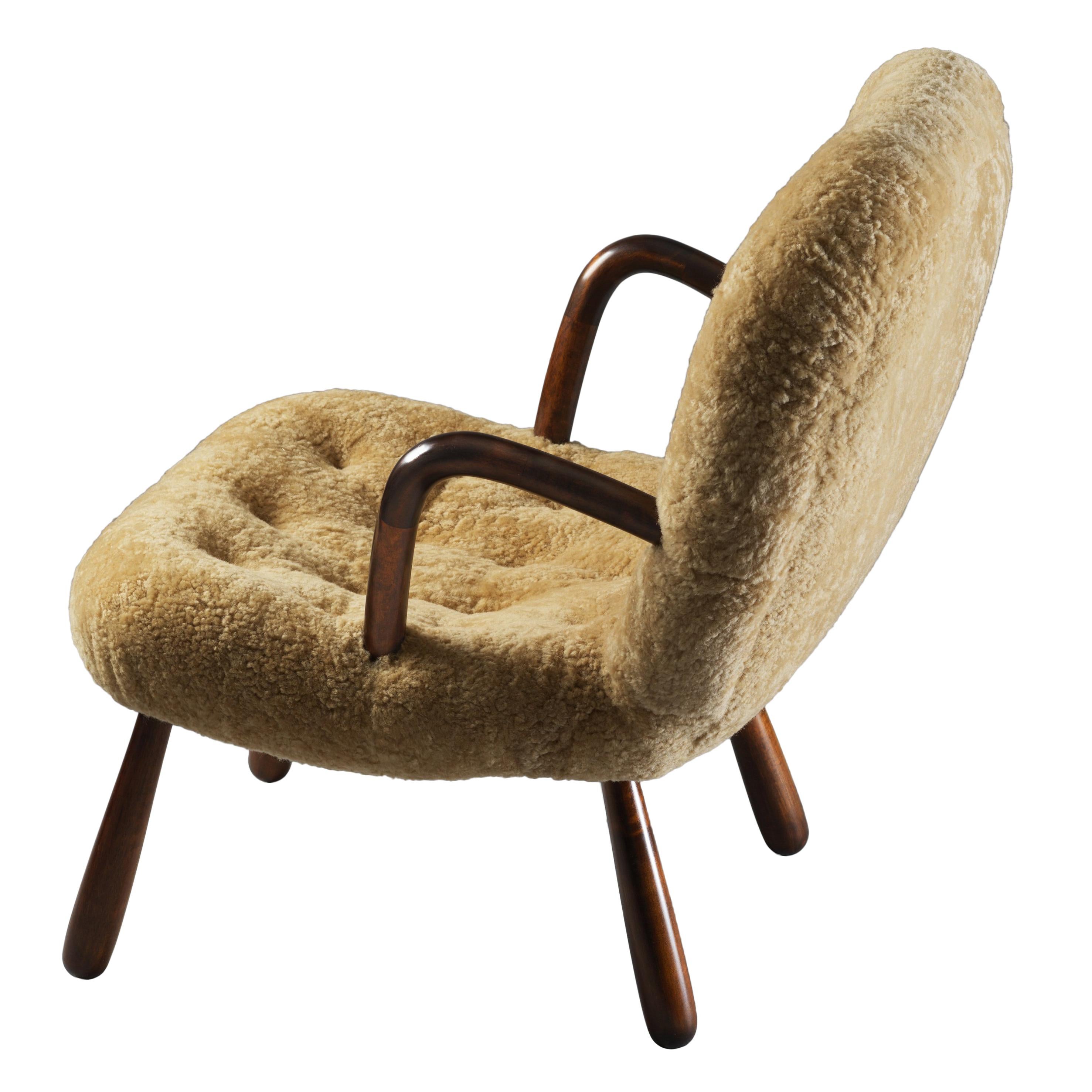 Philip Arctander ( attributed) Clam Armchair Lambskin and Stained Wood, 1940s