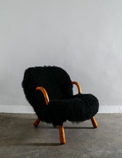 Philip Arctander "Clam Chair" in Black Curly Sheepskin, 1940s