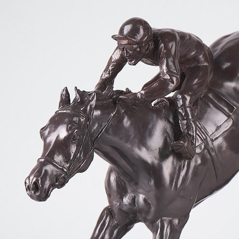 Bronze Sculpture of jockey AP McCoy - By Philip Blacker

Philip Blacker was born in 1949 and was educated in Dorset. On leaving school he became a steeplechase jockey and rode professionally for 13 years, during which he rode 340 winners and