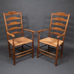 Philip Clissett Bonito juego de cuatro sillones con respaldo de escalera de fresno de la época Arts & Crafts