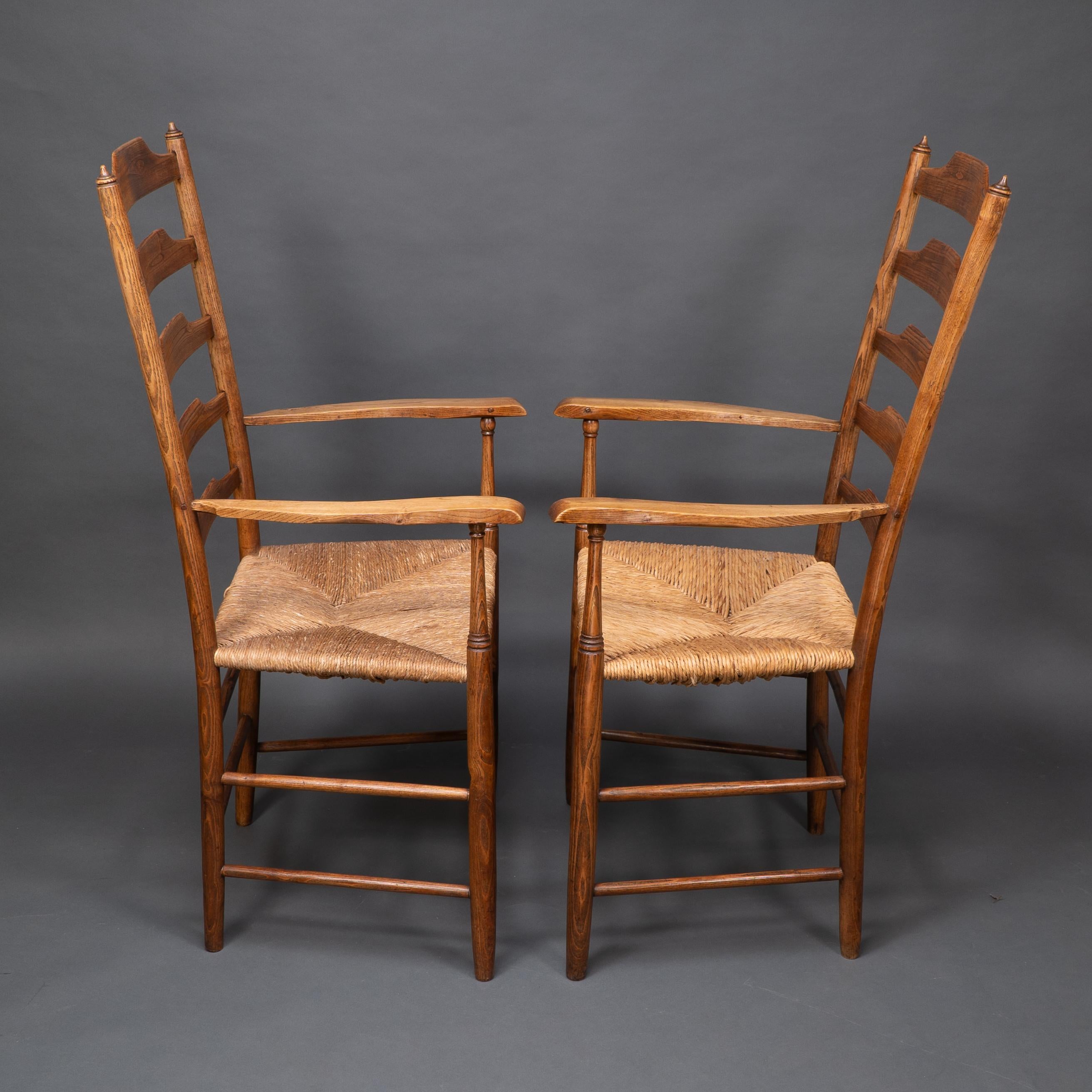 English Philip Clissett A fine set of four early Arts & Crafts ash ladder back armchairs For Sale