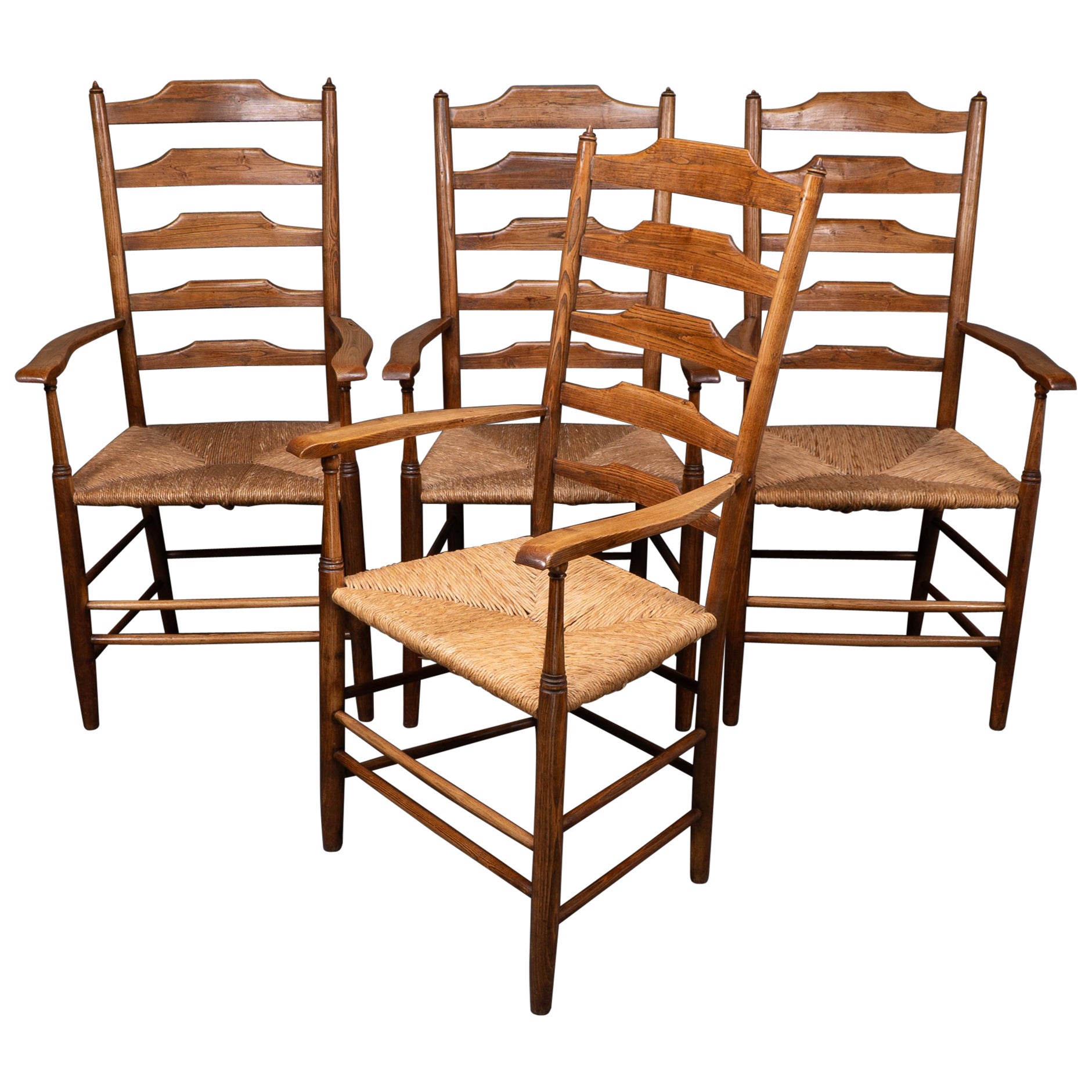 Philip Clissett Bonito juego de cuatro sillones con respaldo de escalera de fresno de la época Arts & Crafts en venta