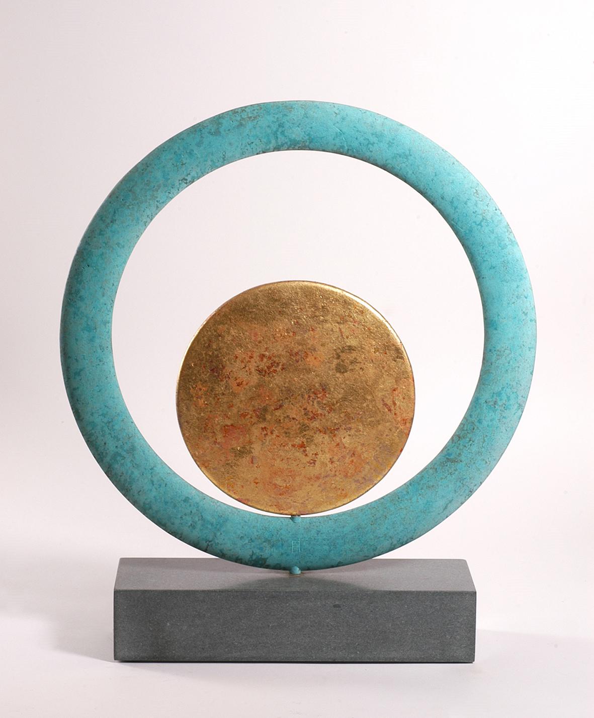 2 parts bronze independently rotating on a Cumbrian slate base
Series of one-off variations 
Stamped with monogram signature and uniquely numbered 391F
The outer ring is solid bronze with an oxidised finish and is the common element in the series of
