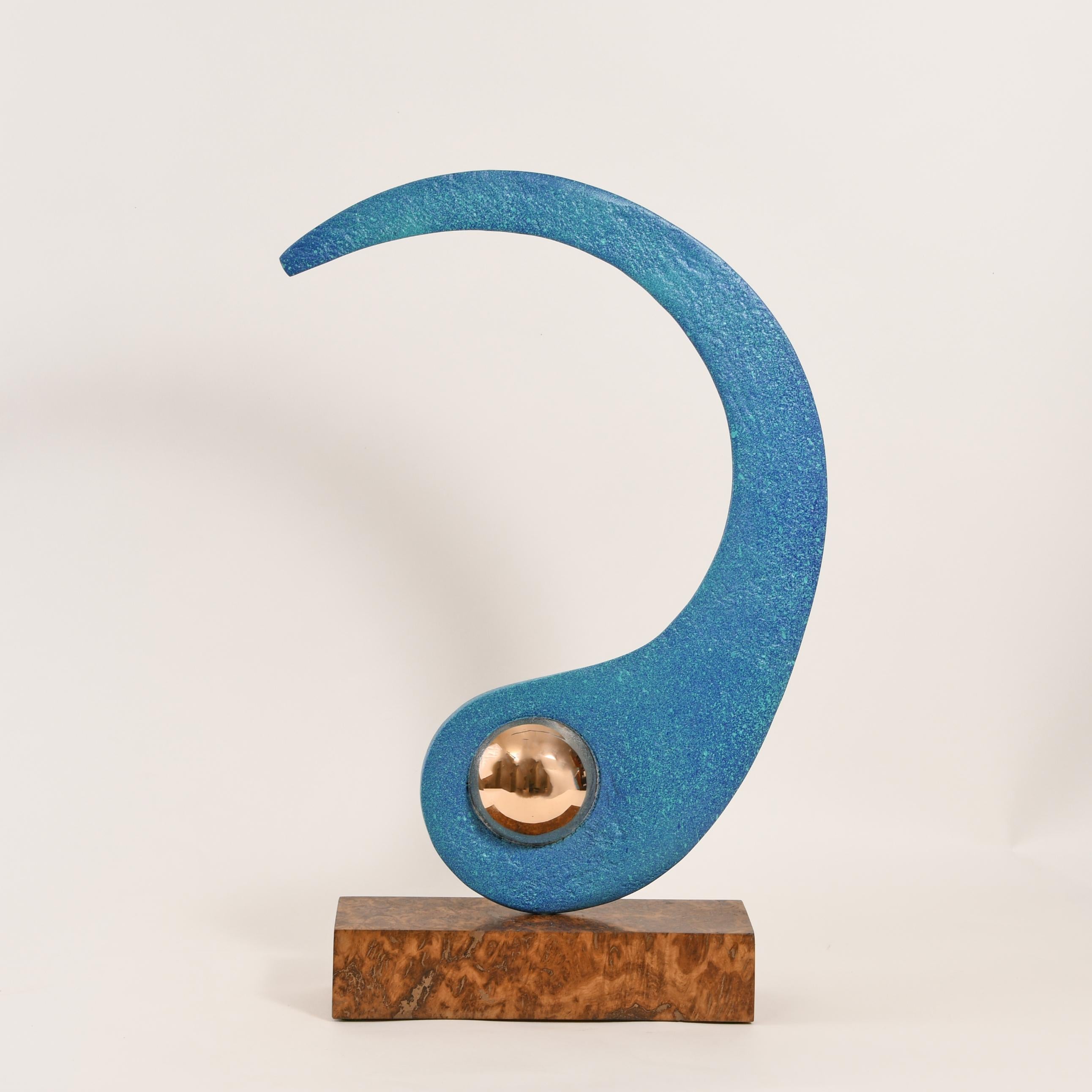 Bronze freely rotating on a Cumbrian slate base
Series of variations
Stamped with monogram signature and uniquely numbered 627A
The polished bronze spheres require care as they will colour down over time or tarnish more rapidly as a result of