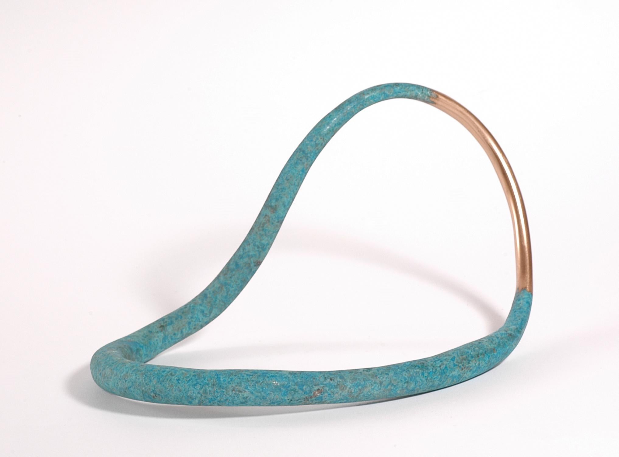 Bronze
Series of individual variations
Stamped with monogram signature on underside and uniquely numbered 615A
This sculpture sits low on a surface and is ideal for placement on a low table where it can be viewed from above and the many different