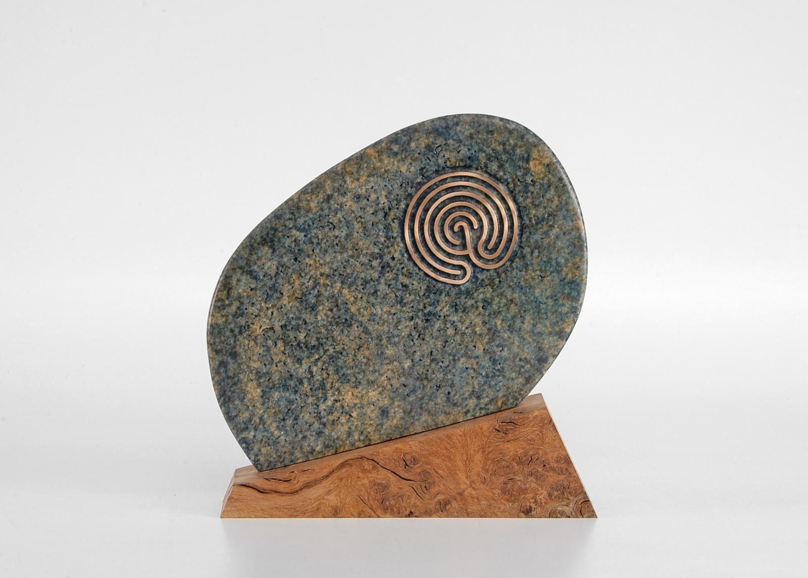 Bronze on a burr oak base
Edition of 9 variations in colour / patination
Stamped with monogram signature and uniquely numbered 418, 5/9
The labyrinth patterns, different on each side, are part of the bronze casting and finely rubbed to show the