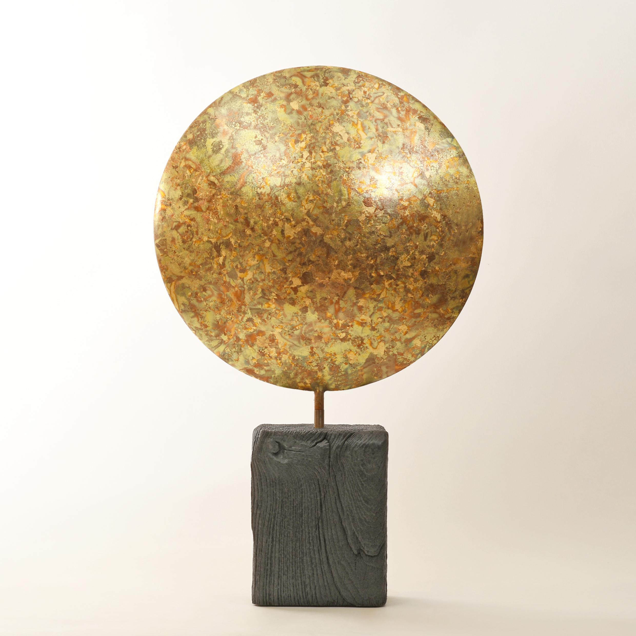 Leafed resin freely rotating on a scorched oak base
Unique 
Stamped with monogram signature and uniquely numbered 793
The pulverised metal leaf is lacquered for protection
Turning the sculpture allows face to be chosen or an angle to be set
Weight: