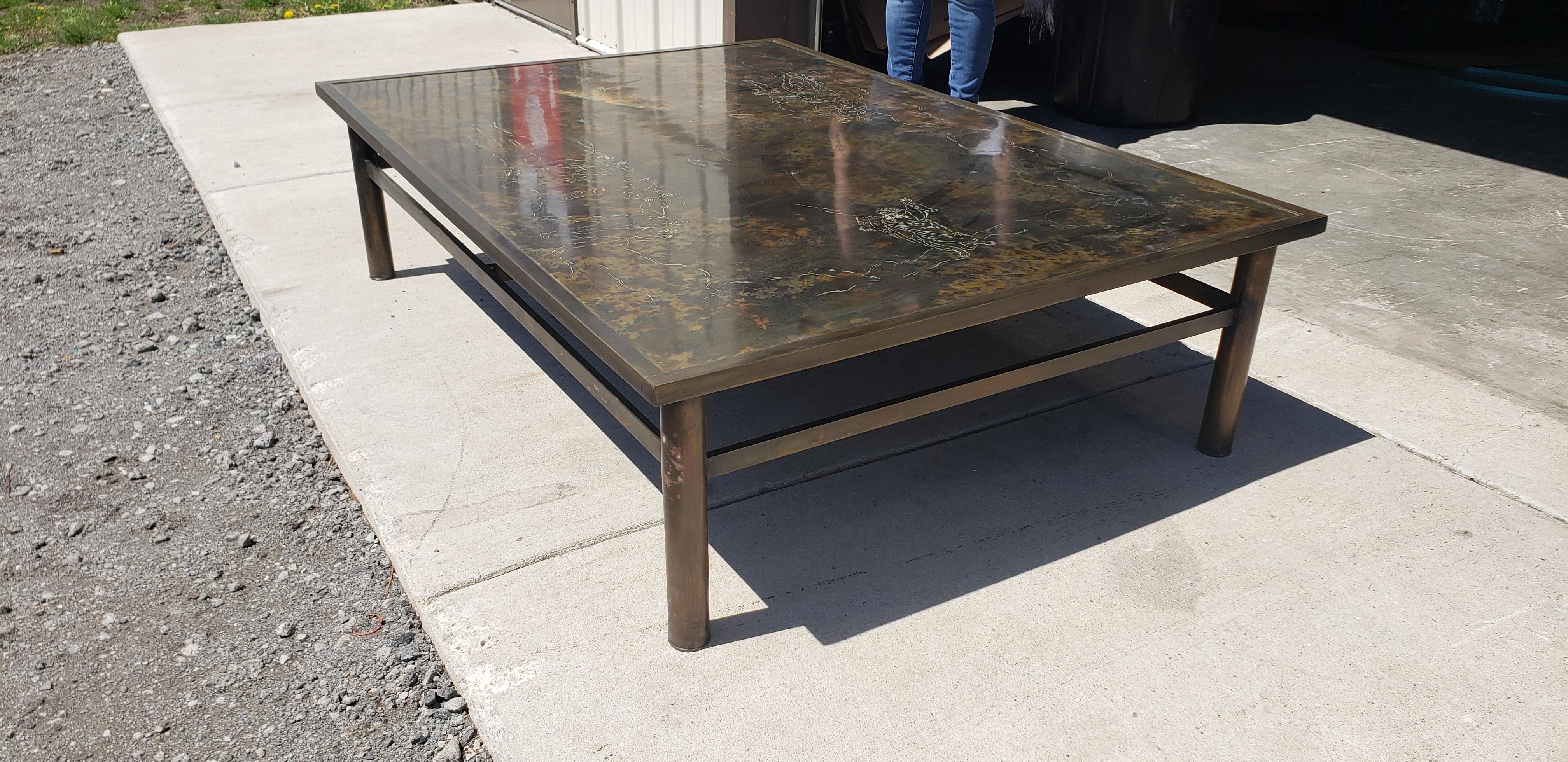 A fine Philip and Kelvin LaVerne acid etched bronze coffee table of large size. This fine table was custom made in the Philip and Kelvin LaVerne workshops for the client. 
The patina is exceptional. Better than most

The LaVernes’ position at the