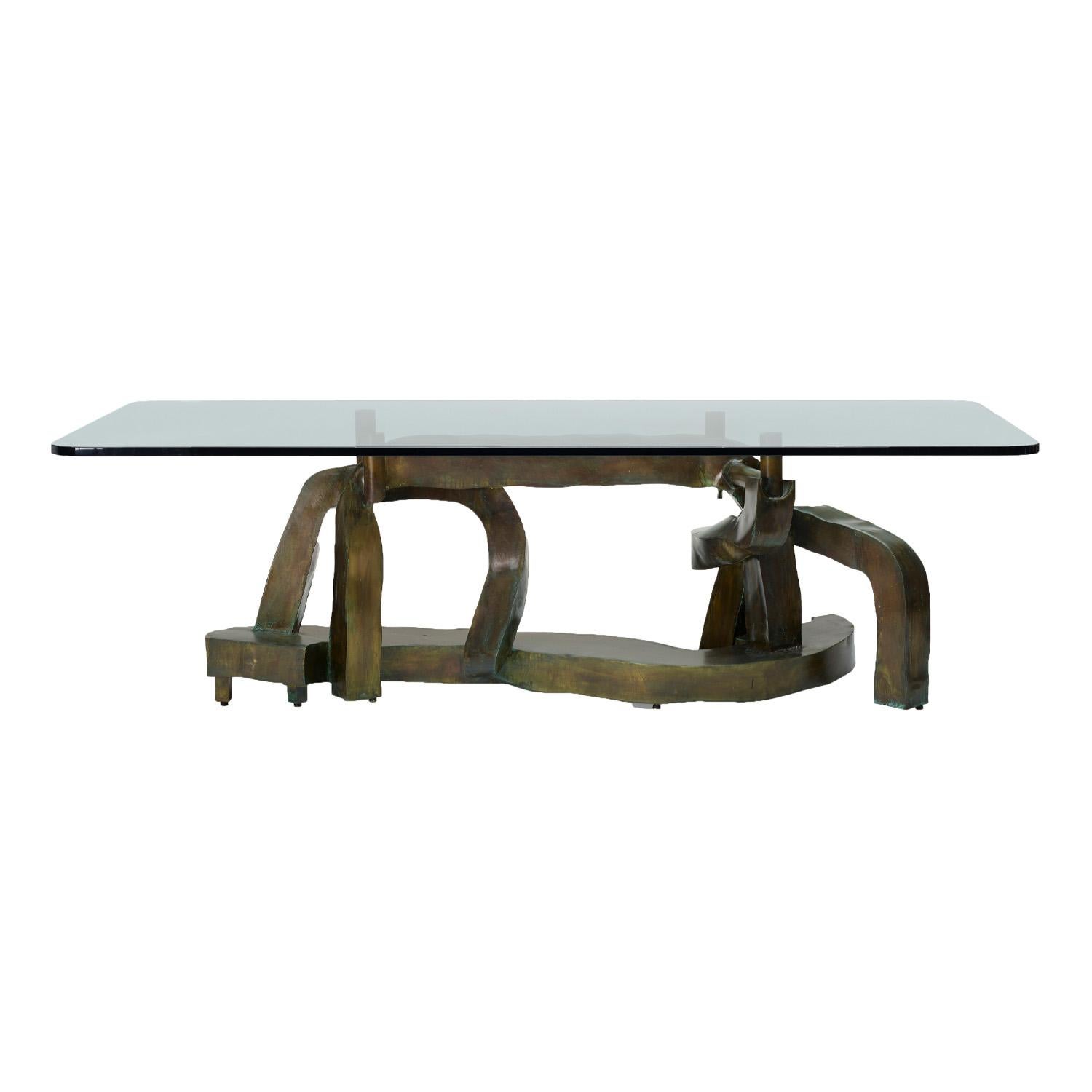 Rare and important hand-welded and patinated bronze sculpture dining table “Symphony” with glass top by Philip and Kelvin LaVerne, American 1970’s (signed “Philip Kelvin LaVerne”). According to Kelvin LaVerne, only 3 were made. Philip and Kelvin