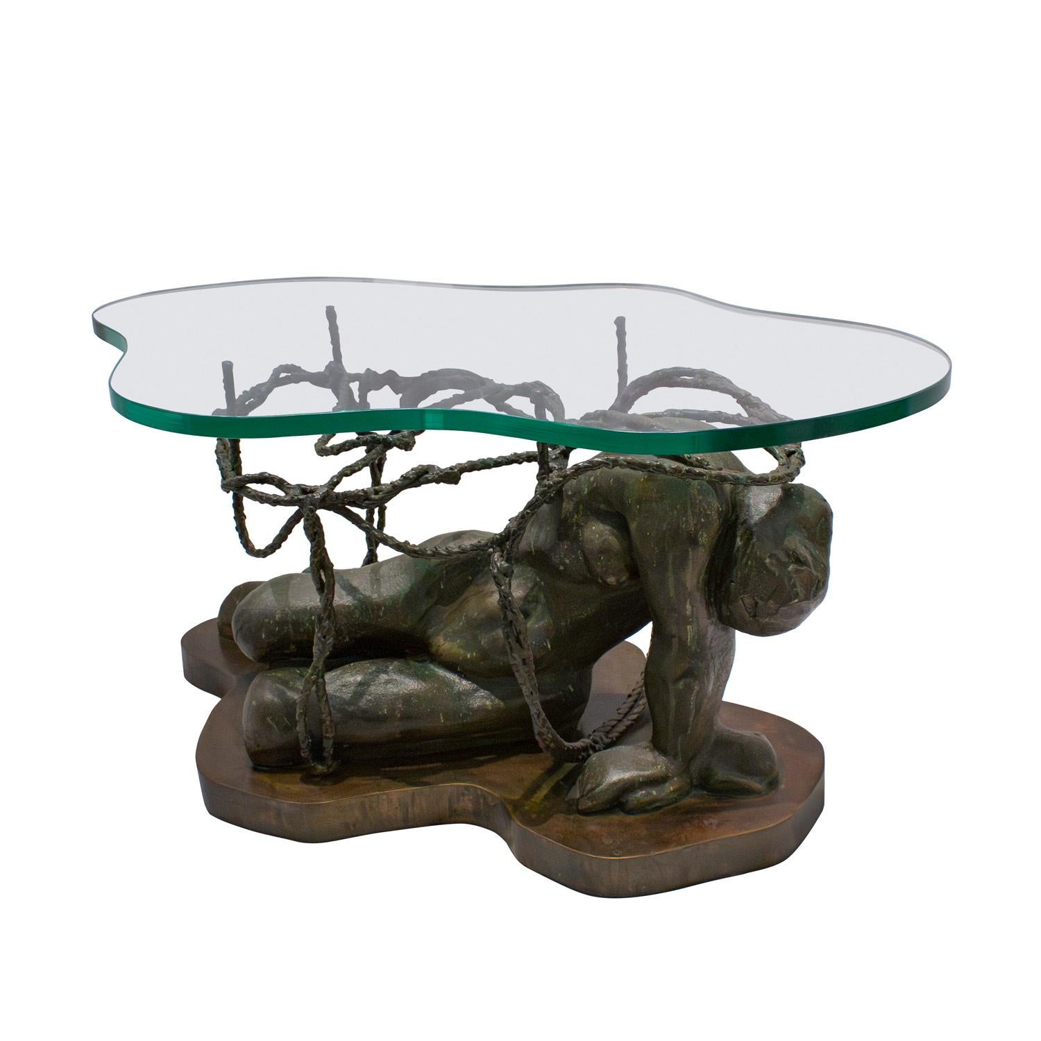 Important and rare “Persephone Enslaved” cast sculpture in patinated bronze with green patina and hand-painted enamels in green and blue with welded chain elements on a patinated bronze base with customized thick glass top by Philip and Kelvin