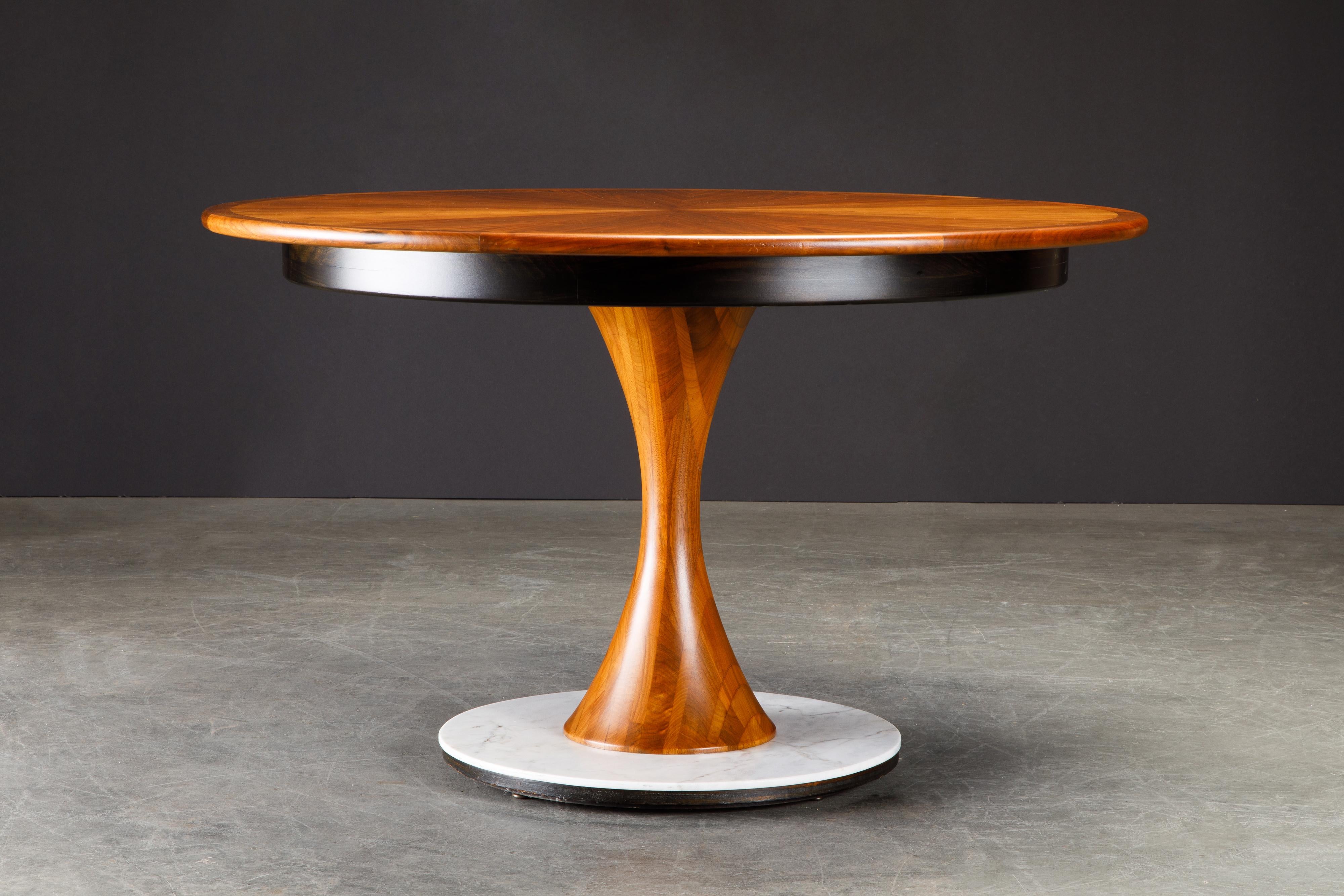 American Craftsman Philip Lloyd Powell Walnut, Marble and Ebonized Wood Center Dining Table, 1970s