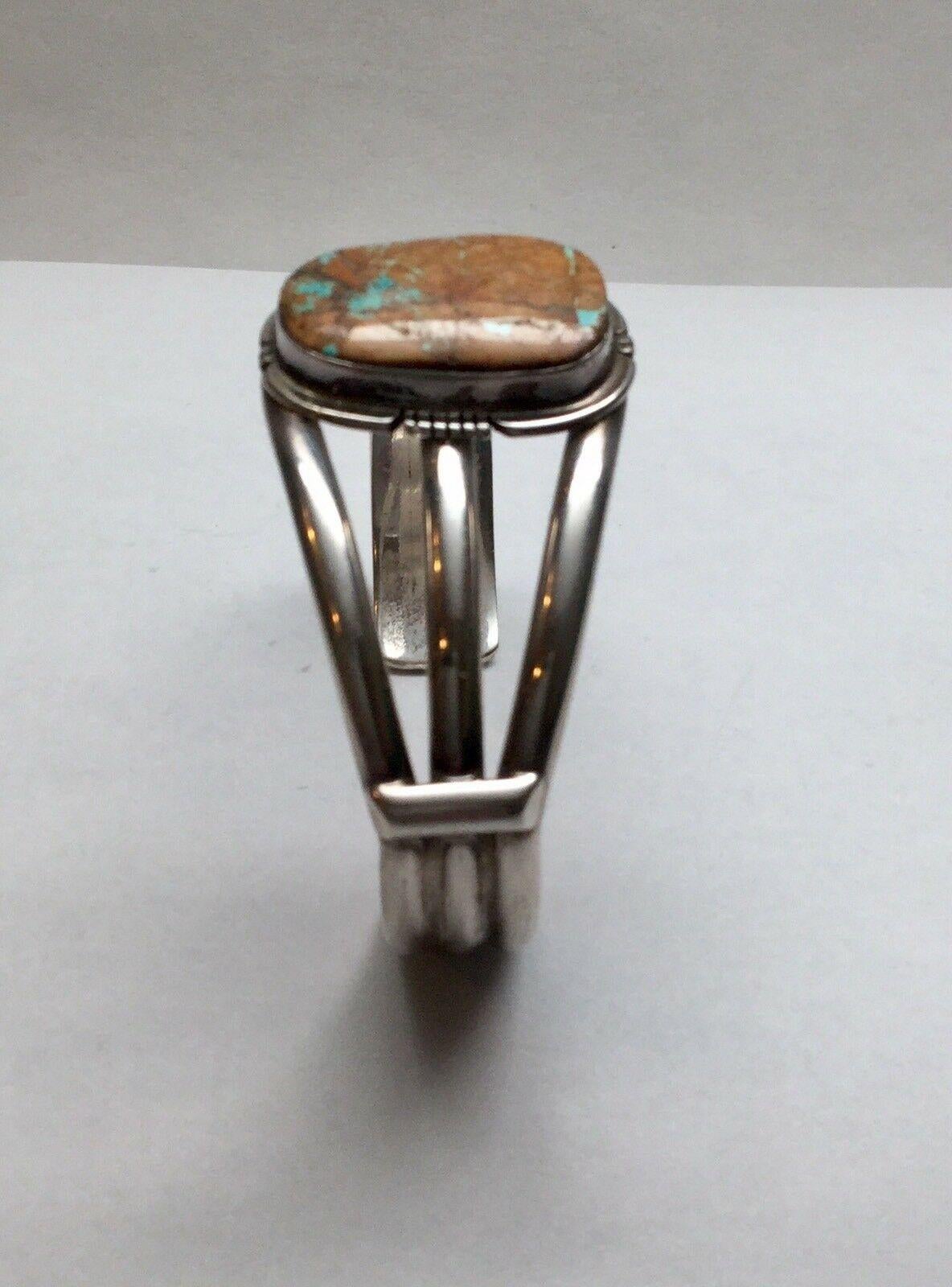 Philip Sanchez, Navajo sterling silver Royston Ribbon turquoise cuff bracelet.

Marked: P.Sanchez, Sterling

Measures: 5 1/2