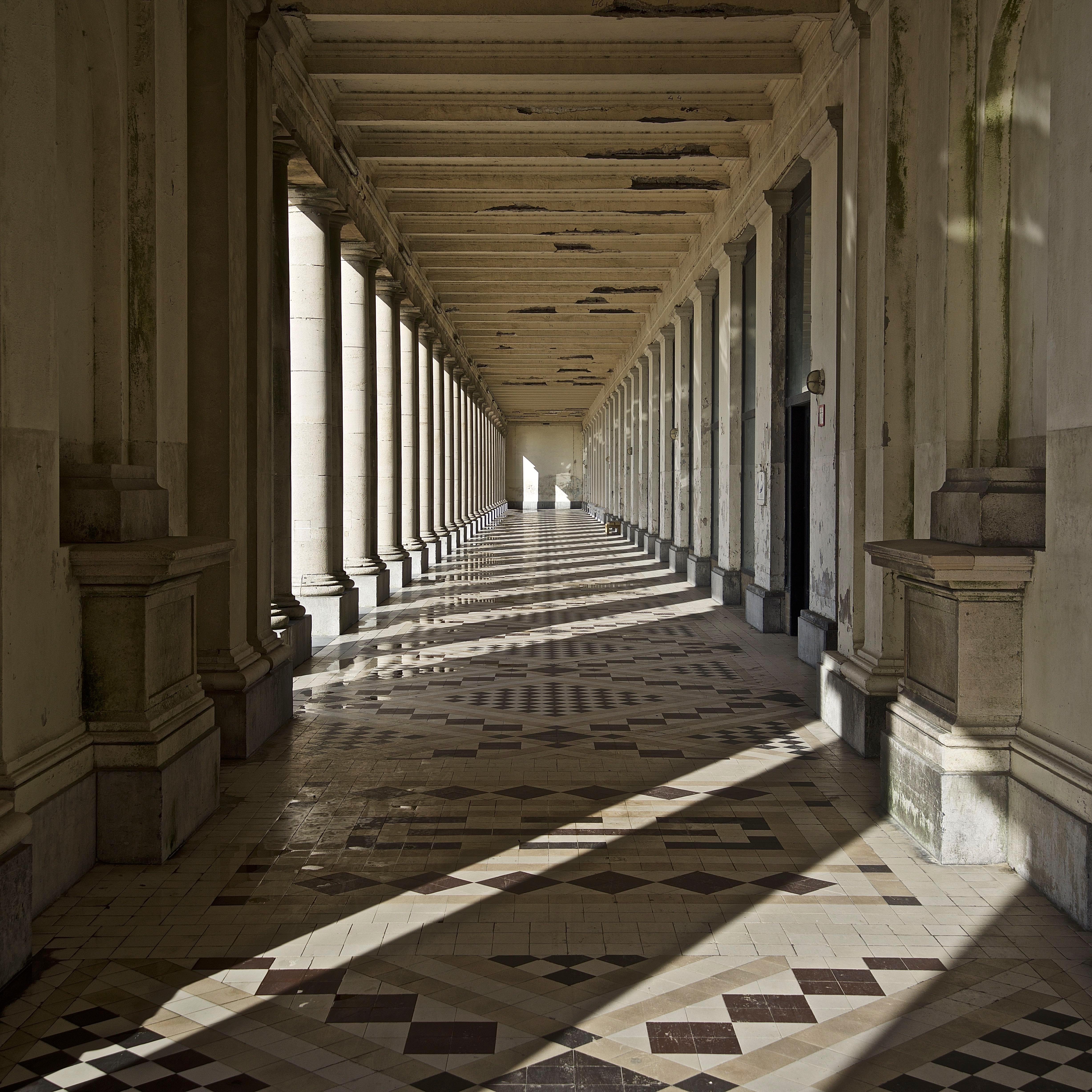 Philip Shalam Color Photograph - OSTEND A- CONTEMPORARY PHOTO-COLOUR PHOTO-CORRIDOR-SHADOWS-COLUMNS-