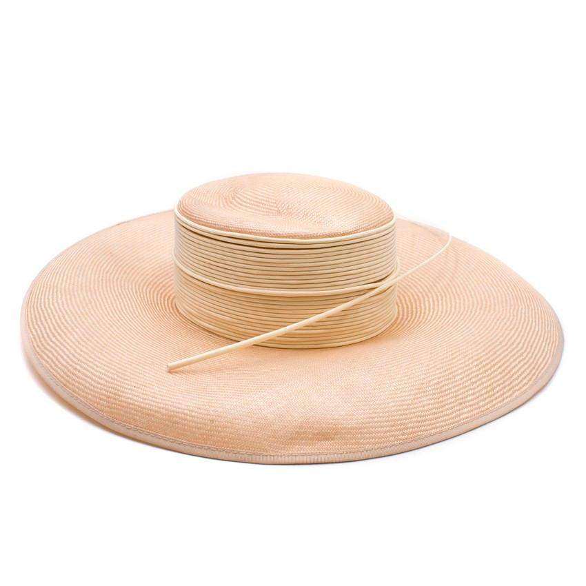 Philip Somerville Nude Straw Hat with Straw details

- Straw Trim
- Satin lining
- Original tissue/packaging
- Original hat box - slight damage


Please note, these items are pre-owned and may show some signs of storage, even when unworn and unused.