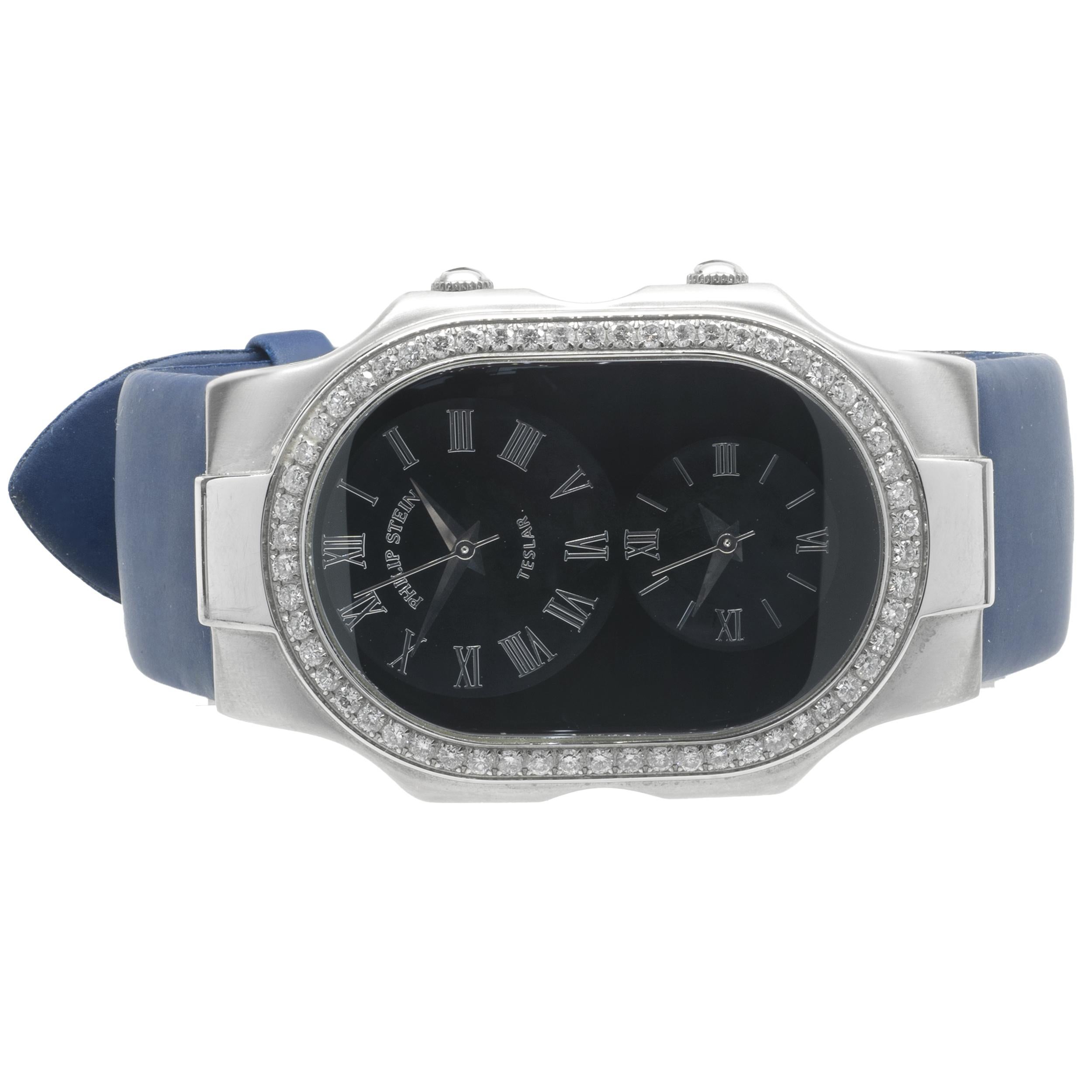 Movement: quartz
Function: hours, minutes, seconds, two-time zone
Case: 50mm x 34mm stainless steel case with sapphire crystal, stainless steel fixed bezel, stainless steel winding crowns, water resistant to 30 meters
Band: navy blue rubber strap