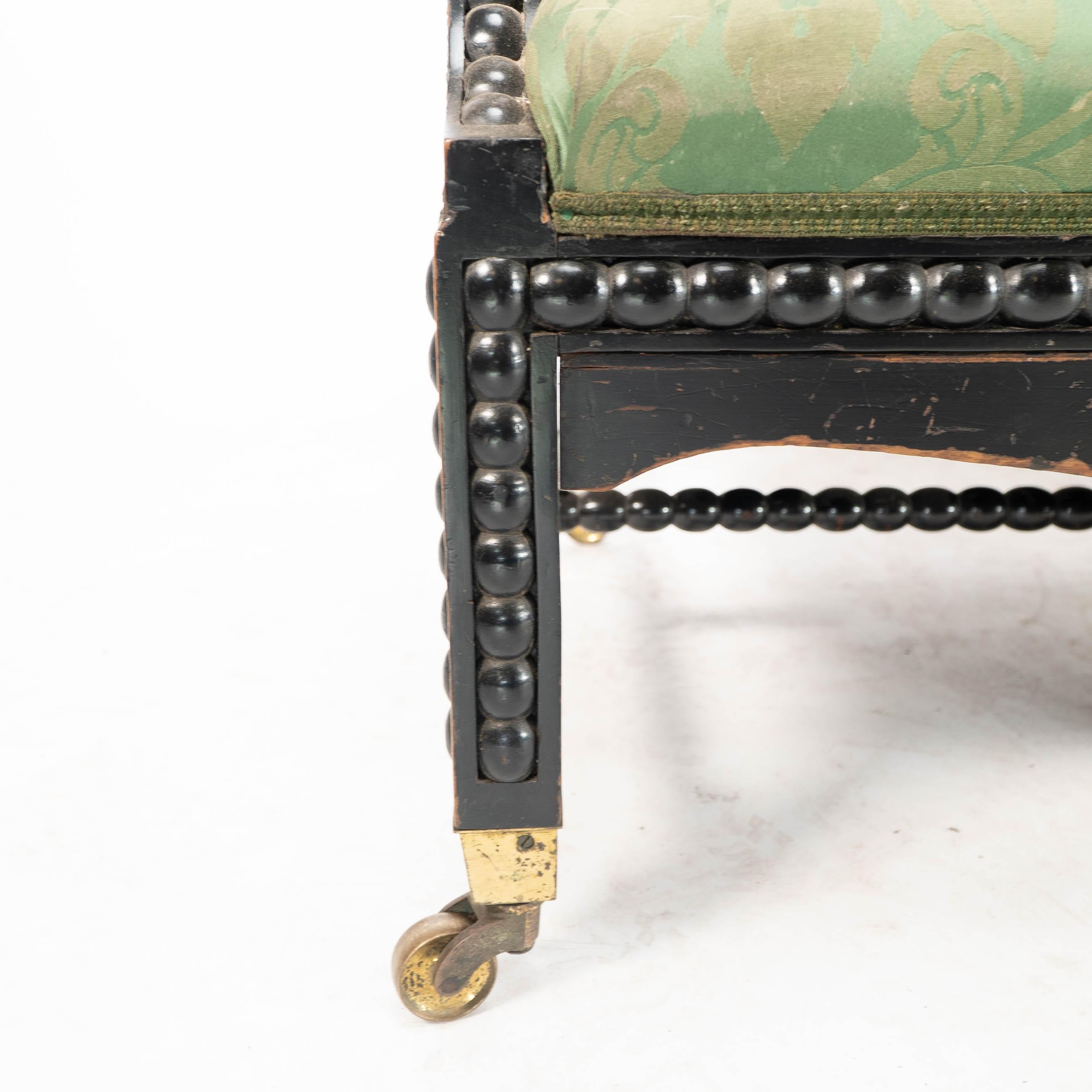 Philip Webb for Morris & Co. Aesthetic Movement Ebonised Settee with Bobbins For Sale 5
