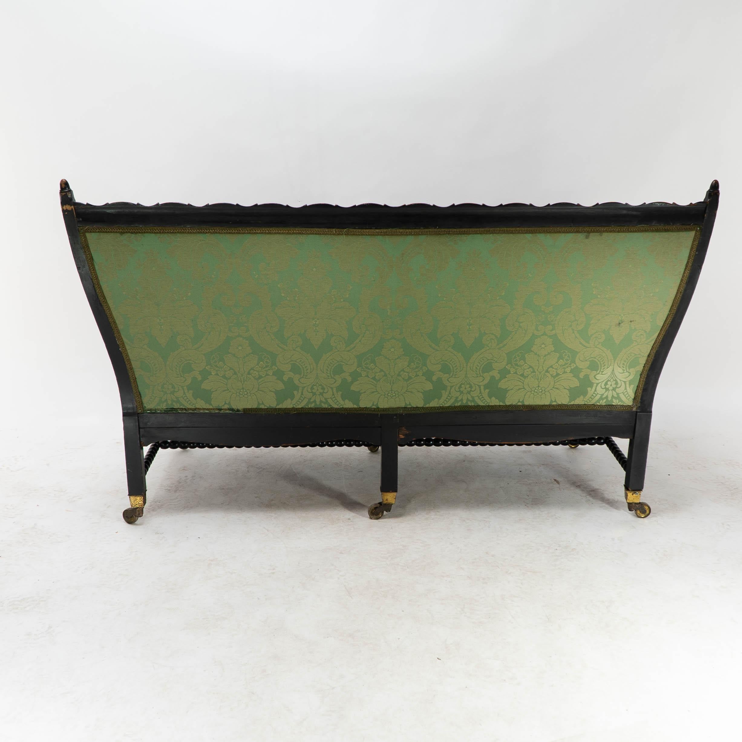Philip Webb for Morris & Co. Aesthetic Movement Ebonised Settee with Bobbins For Sale 9