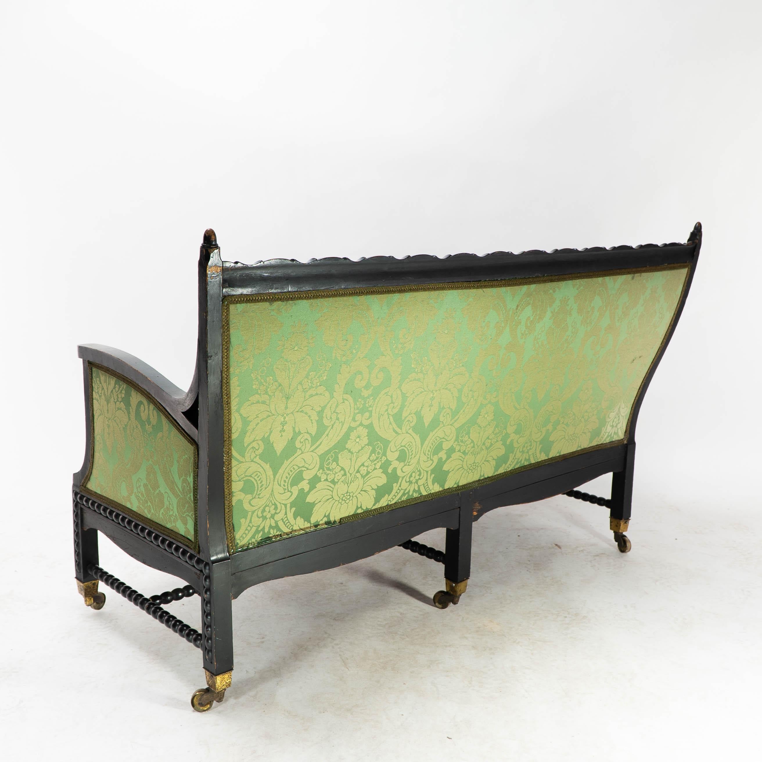 Philip Webb for Morris & Co. Aesthetic Movement Ebonised Settee with Bobbins For Sale 10