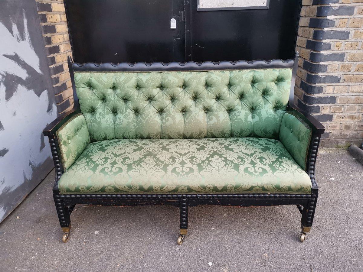 Philip Webb for Morris, Marshall, Faulkner & Co. The firm became Morris & Co in 1875.
A rare Aesthetic Movement Ebonised Settee.
Professionally re-upholstered in period-style fabric.
This settee is from the same stable as the famous bobbin-turned