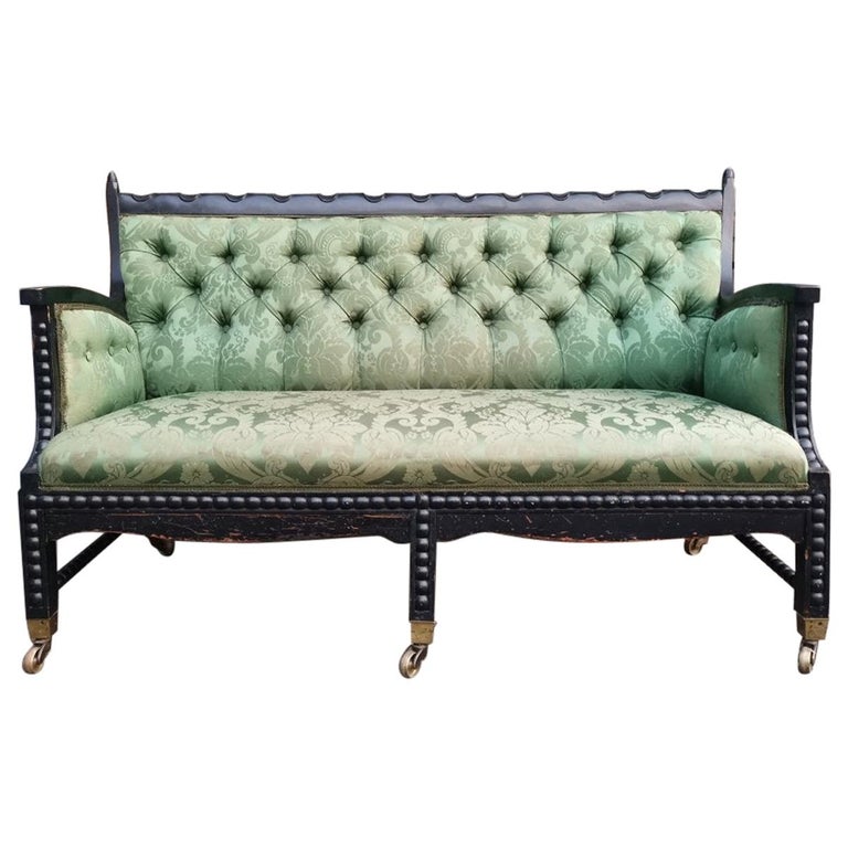 Philip Webb for Morris & Co. Arts and Crafts–style ebonized settee, 1866, offered by Puritan Values