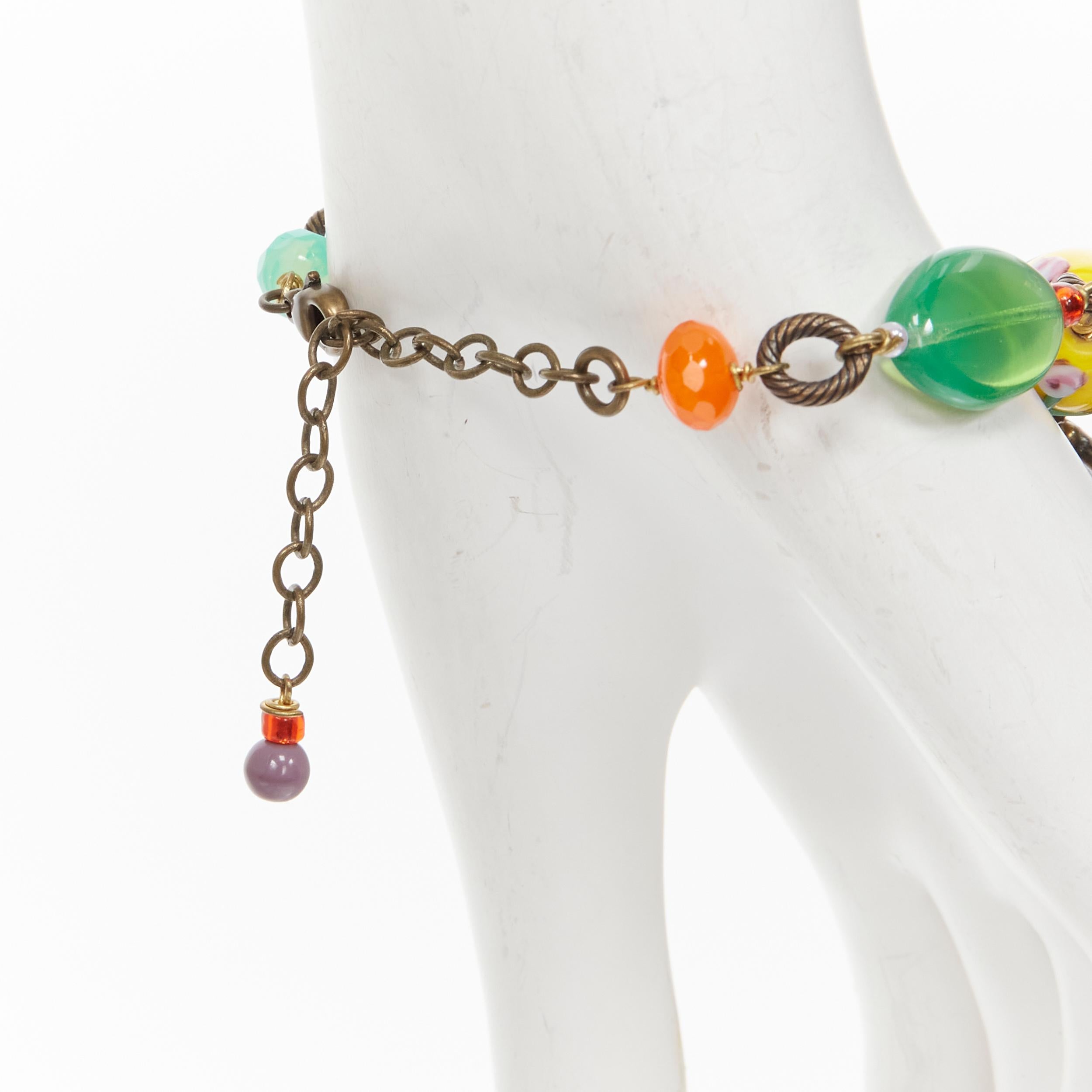 Donna PHILIPE FERRANDIS bracciale a catena in resina con ciondoli colorati a forma di uccello in vendita