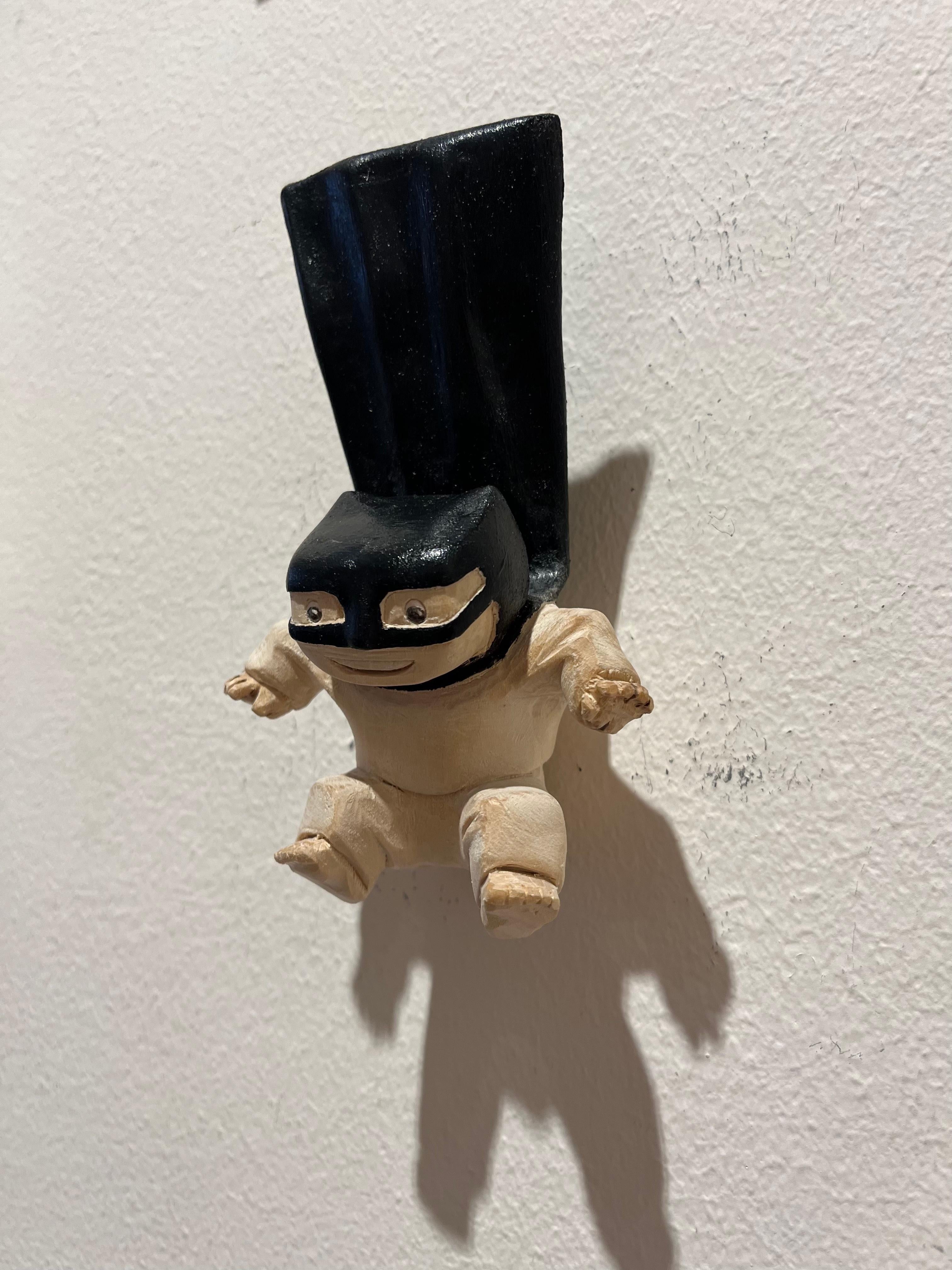 Philipp Liehr Figurative Sculpture - ''Superhero Flies'' Unique Wooden Sculpture of a Boy with a Black Cape