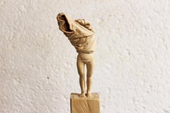 ''Undress I'' Unique Wooden Sculpture of a Figure Undressing, Lindewood