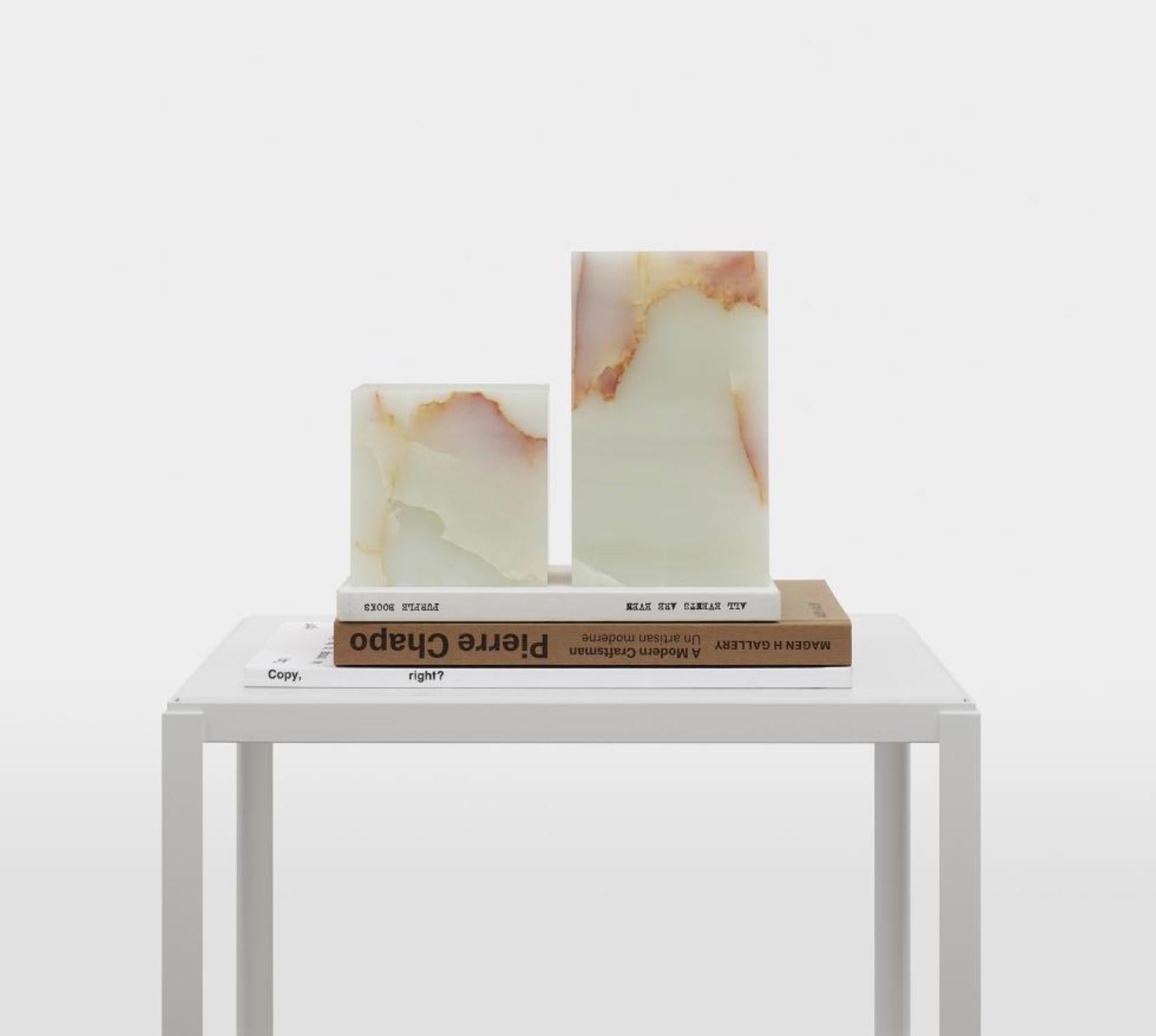 Philipp Mainzer Set of 2 'Stop' Bookends in Onyx for E15 Selected. One 10cm version and one 17cm version. New, current production.

With its cubic form, the book end STOP ONYX is a valuable accessory. Carved from finest onyx, chosen in pale green