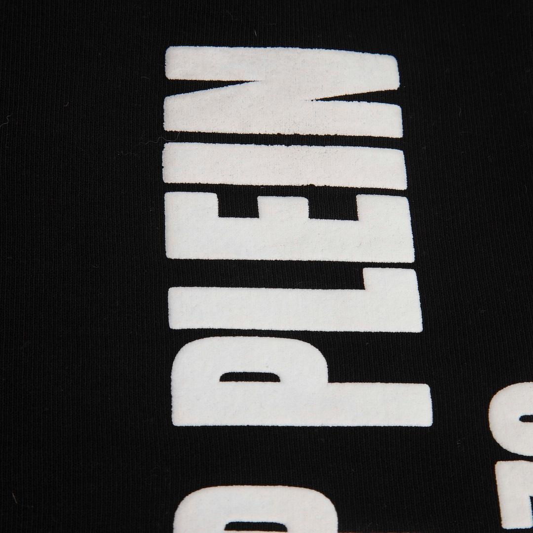 Noir Pantalon de jogging noir avec détails en chaîne Philipp Plein Taille XS en vente