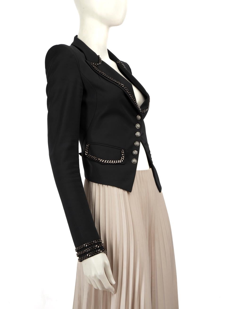 CONDITION is Good. General wear to the blazer is evident. Loose chain on the right sleeve cuff, and left pocket flap. Discolouration on both sleeves in the centre and on the outer armpits. One pull to the weave on the left shoulder and small