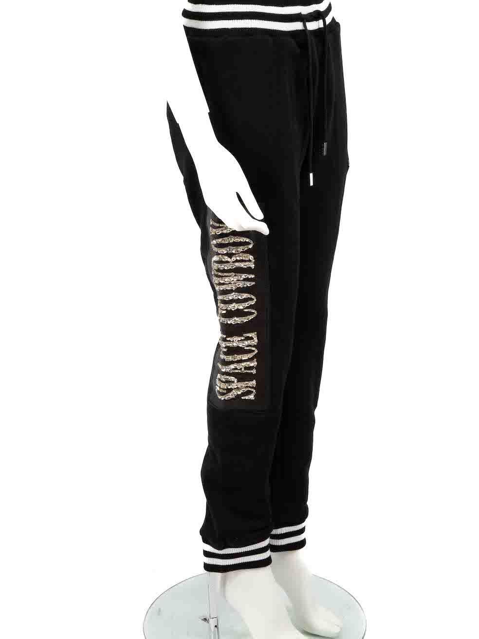 CONDITION is Never worn, with tags. No visible wear to trousers is evident on this new Philipp Plein designer resale item.
 
 Details
 Black
 Cotton
 Jogger trousers
 Embellished 'Space Cowboy' and 'Philipp Plein' detail
 Elasticated waistband
