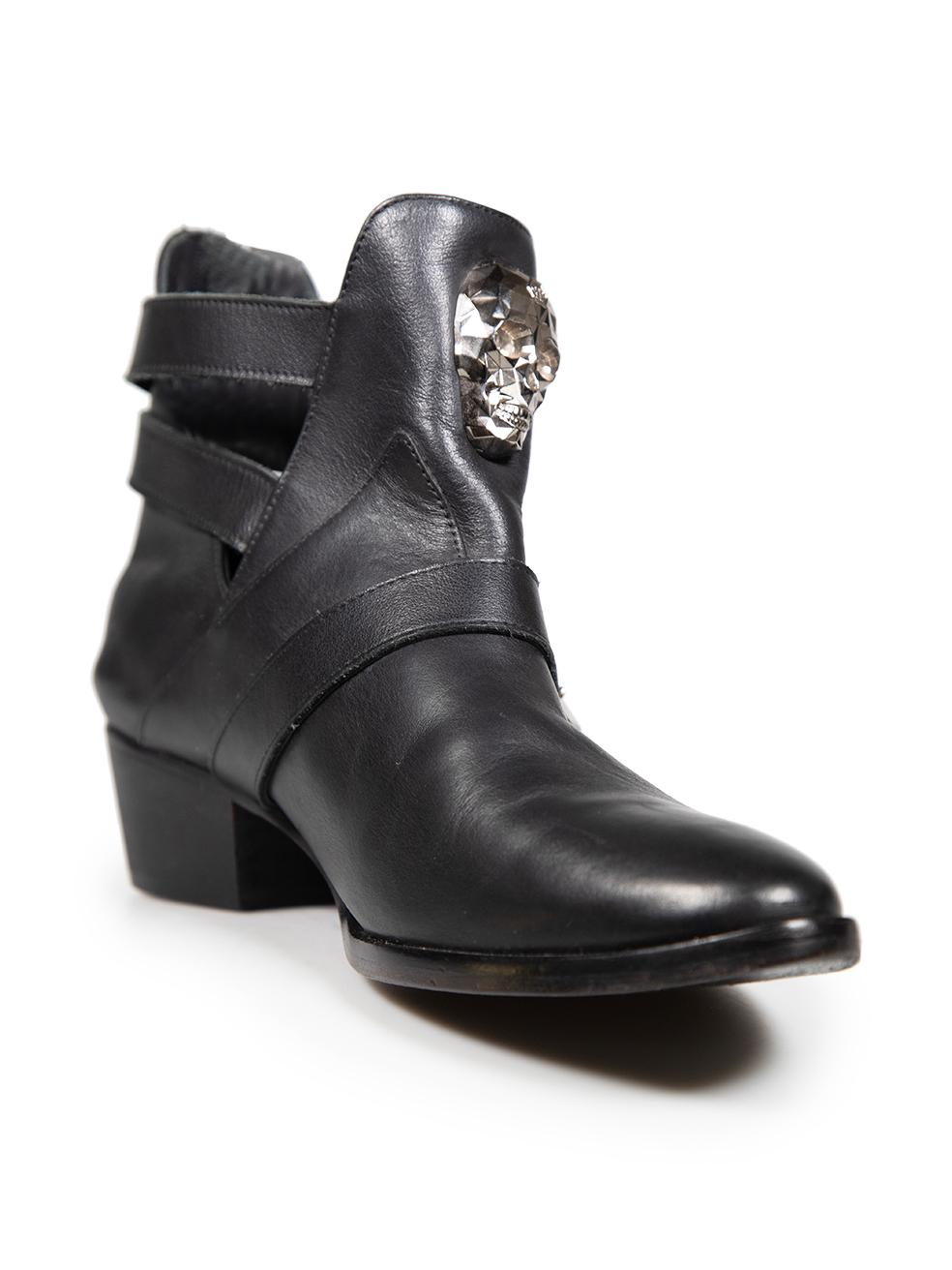 CONDITION is Very good. Minimal wear to the boots is evident. Abrasion to the vamp of both shoes. General creasing to the leather on the vamp and counter of both shoes. Scratching to the ends of the ankle buckles on both shoes on this used Philipp