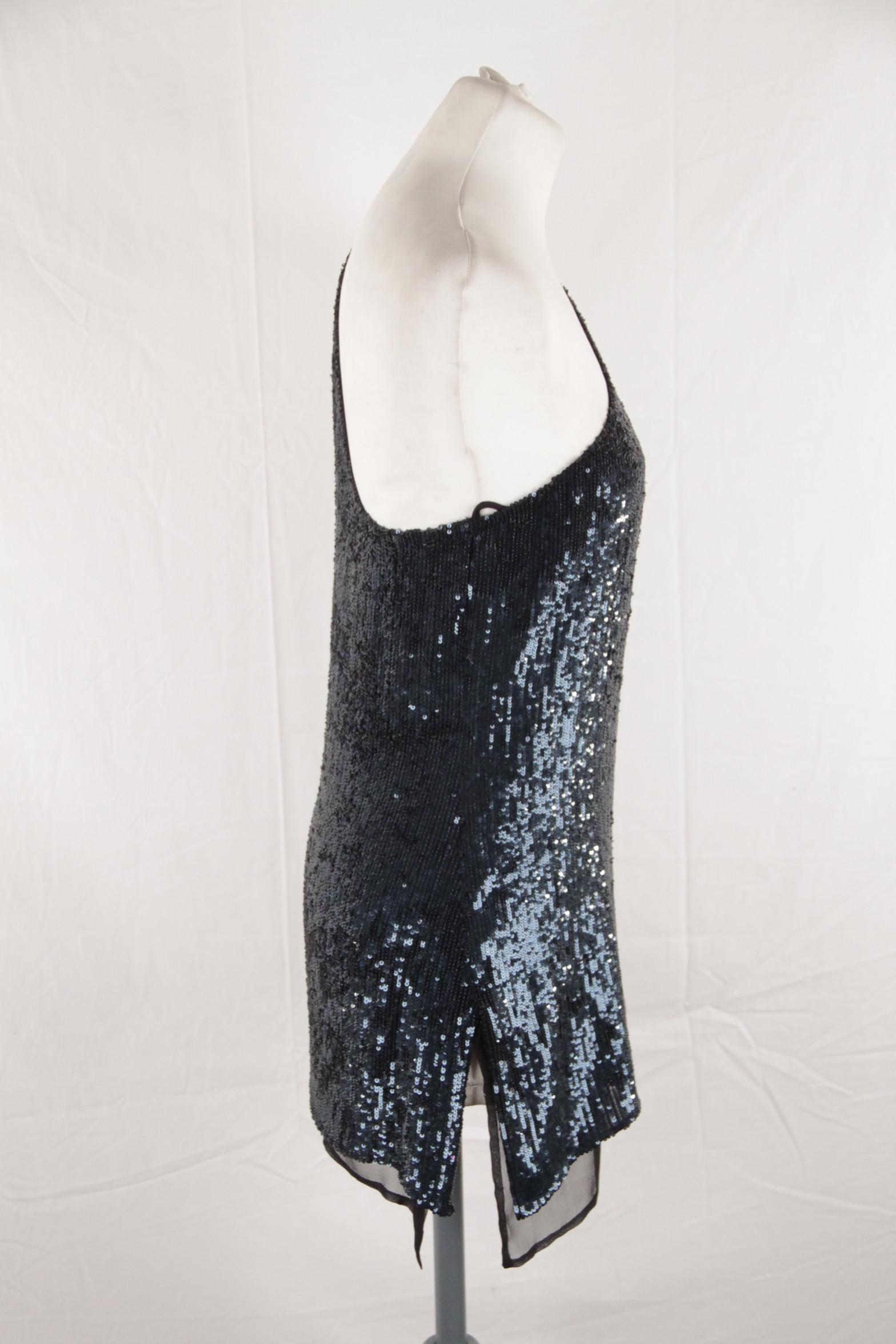 One shoulder top - All over sequin embellishment - 100% Silk - Asymmetric hem - Side zip closure - Size 2 (The size shown for this item is the size indicated by the designer on the label). it should correspond to a SMALL size Logos / Tags: 'PHILIPP