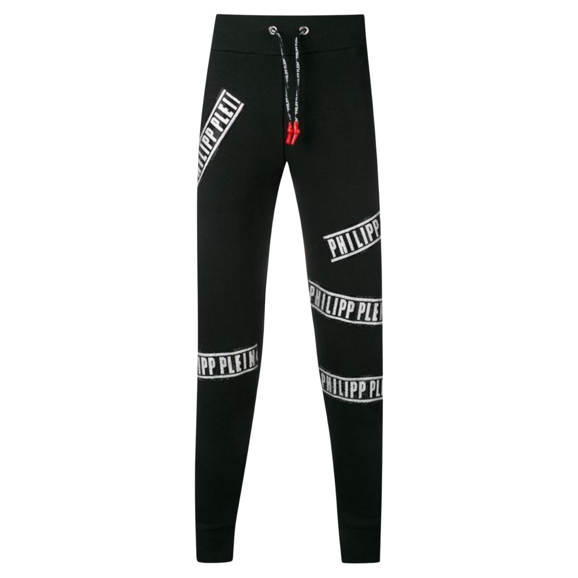 Pantaloni da jogging in cotone con logo in cristallo di Philipp Plein in vendita