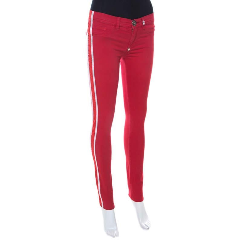 Easy going and super comfortable  these jeggings from Philipp Plein is sure to turn heads. It features contrasting stripes at the sides and designed in a stretch cotton fabric that beautifully takes the shape of your legs. We like it paired with a